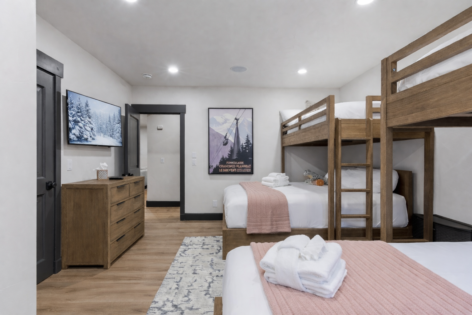 Sleep soundly in the dedicated bunk room, featuring two sets of Twin-over-Queen bunks, perfect for a family getaway or group retreat in Park City.