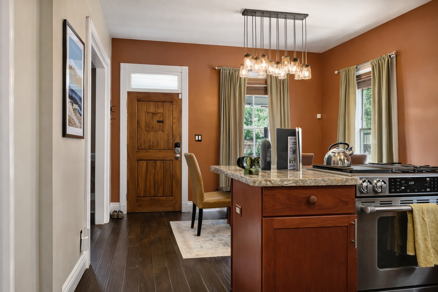 Your stylish kitchen features granite countertops, stainless steel appliances, and warm lighting for memorable meals.