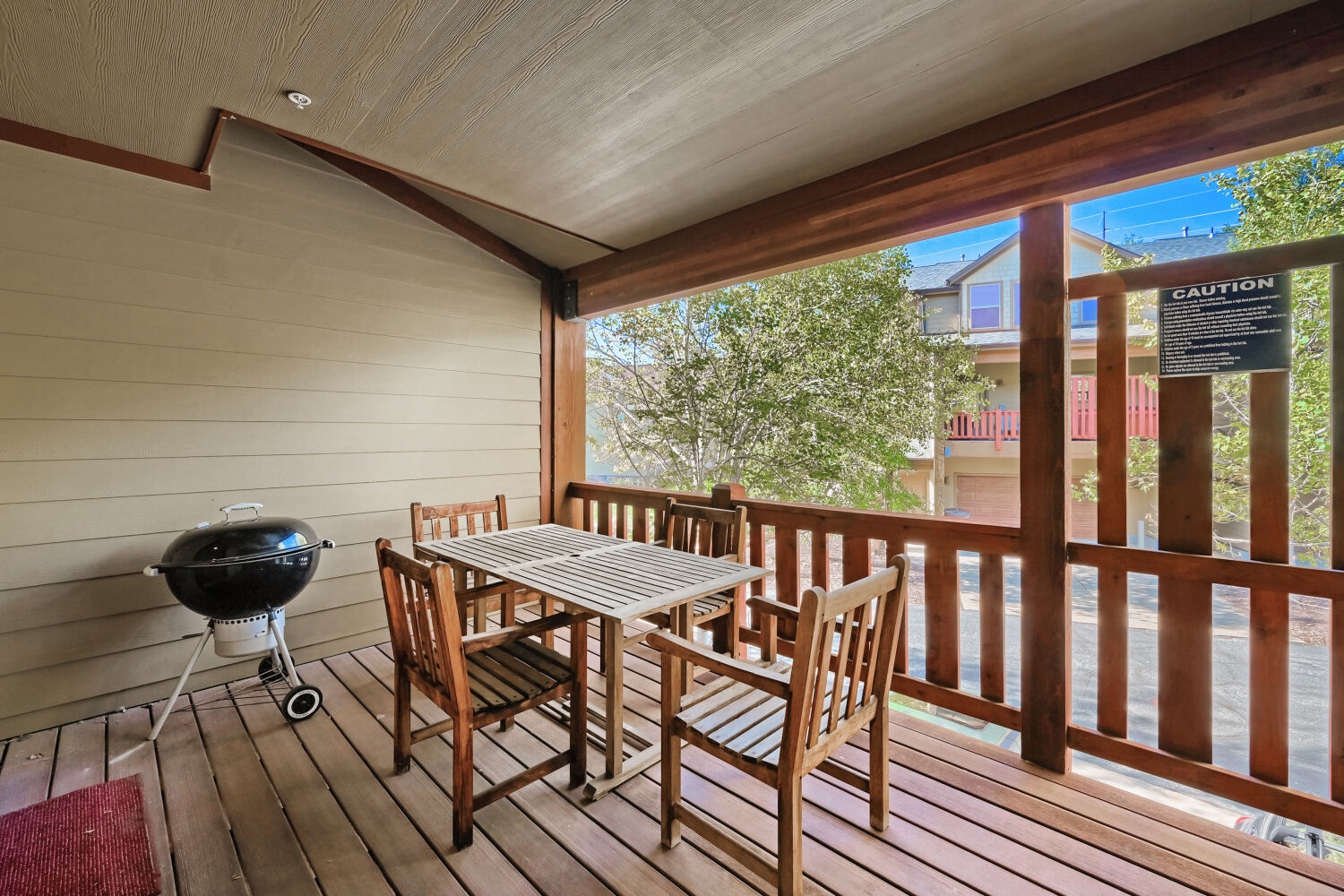 Step onto your covered patio, where morning coffee and al fresco meals come naturally. With a charcoal grill ready and leafy neighborhood views framing every moment, your mountain retreat awaits.