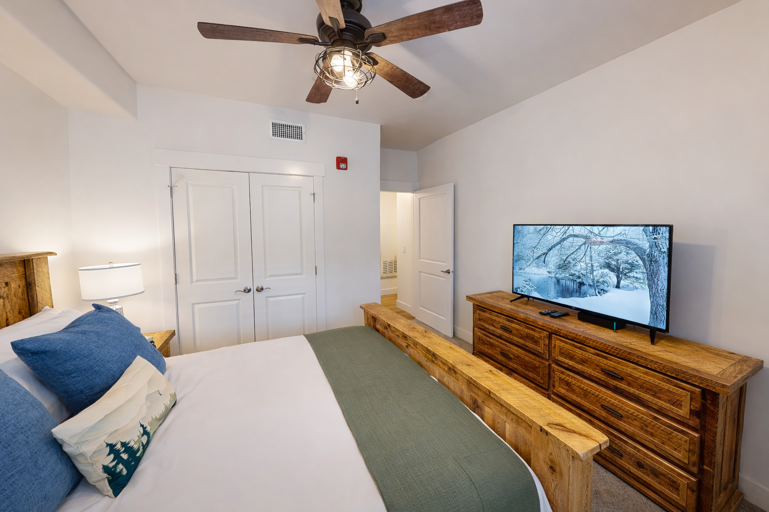 Stay in this mountain-inspired bedroom featuring a queen bed and cozy accents. Part of a luxury Park City townhome just 2 miles from the Canyons ski slopes