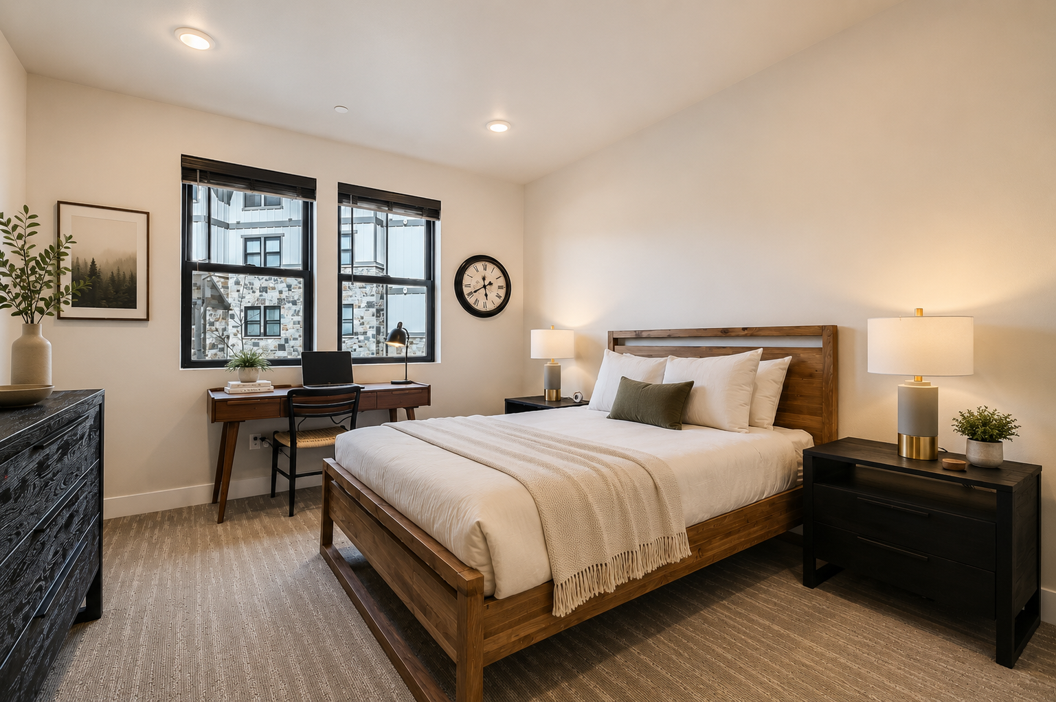 Your peaceful retreat awaits with a plush bed, stylish workspace, and soft lighting to help you unwind after exploring the area.