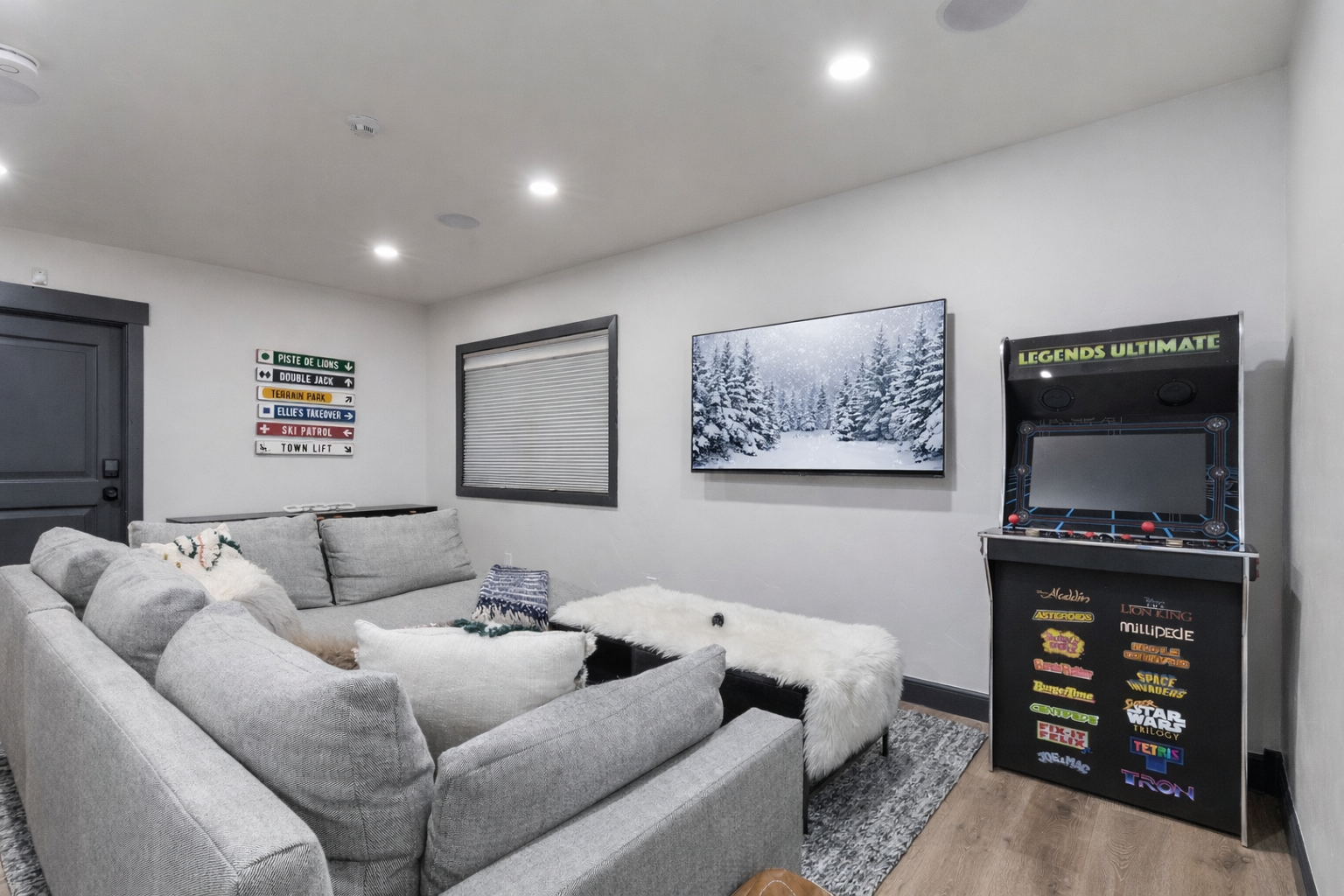 Cozy up on plush sectional seating while you enjoy epic arcade gaming sessions in your own entertainment haven.