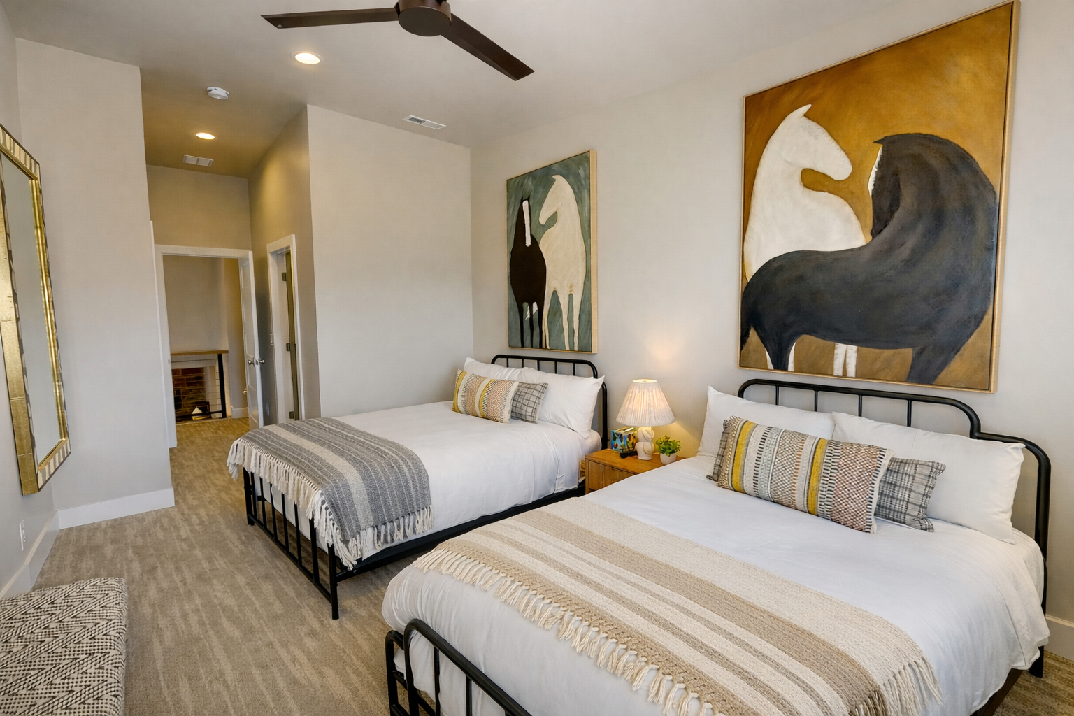 Unwind in your peaceful twin bedroom with cozy artwork and crisp linens that promise the perfect night's rest.