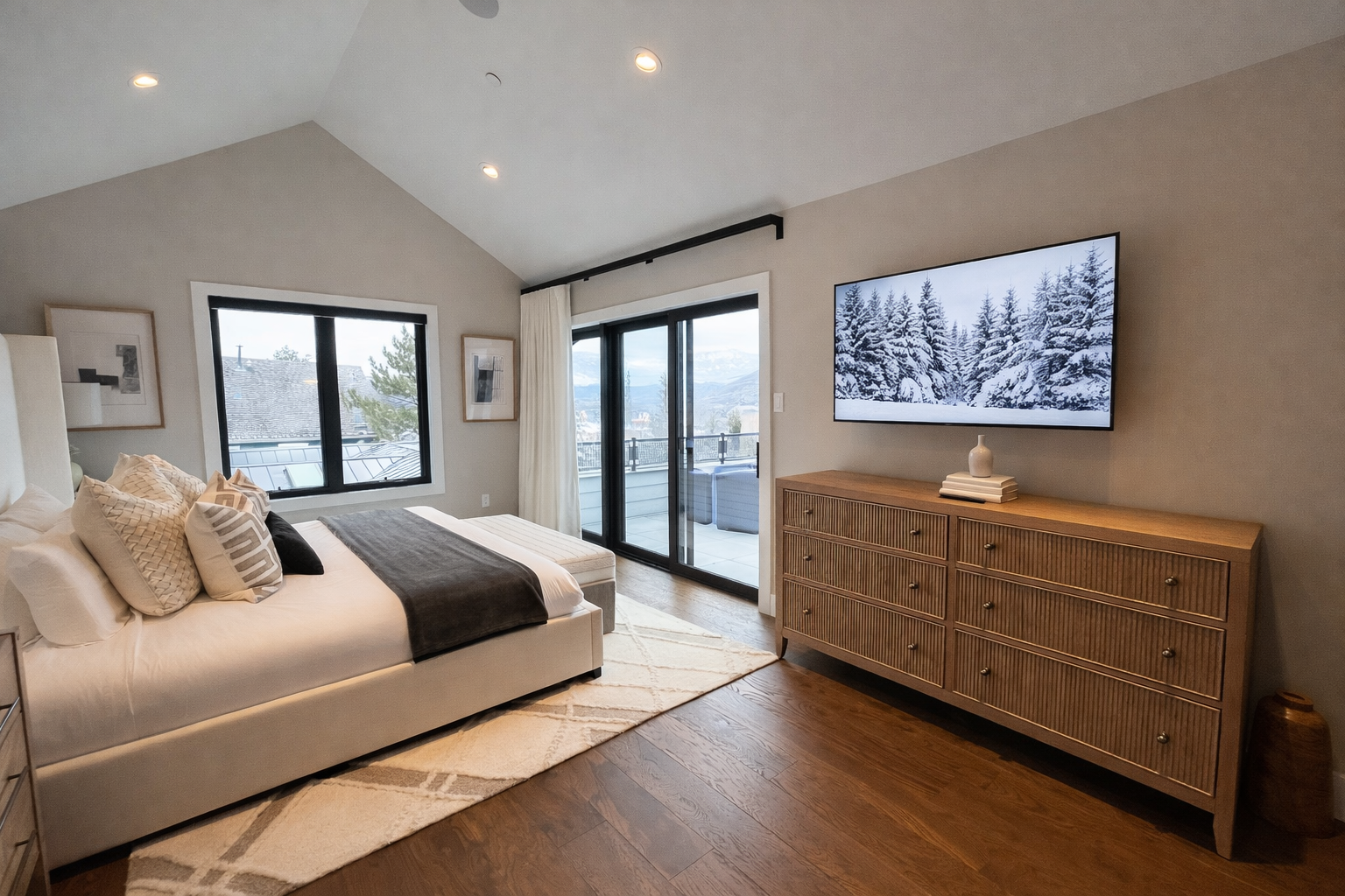 Wake up in your serene sanctuary with mountain views streaming through floor-to-ceiling windows and step onto your private balcony.