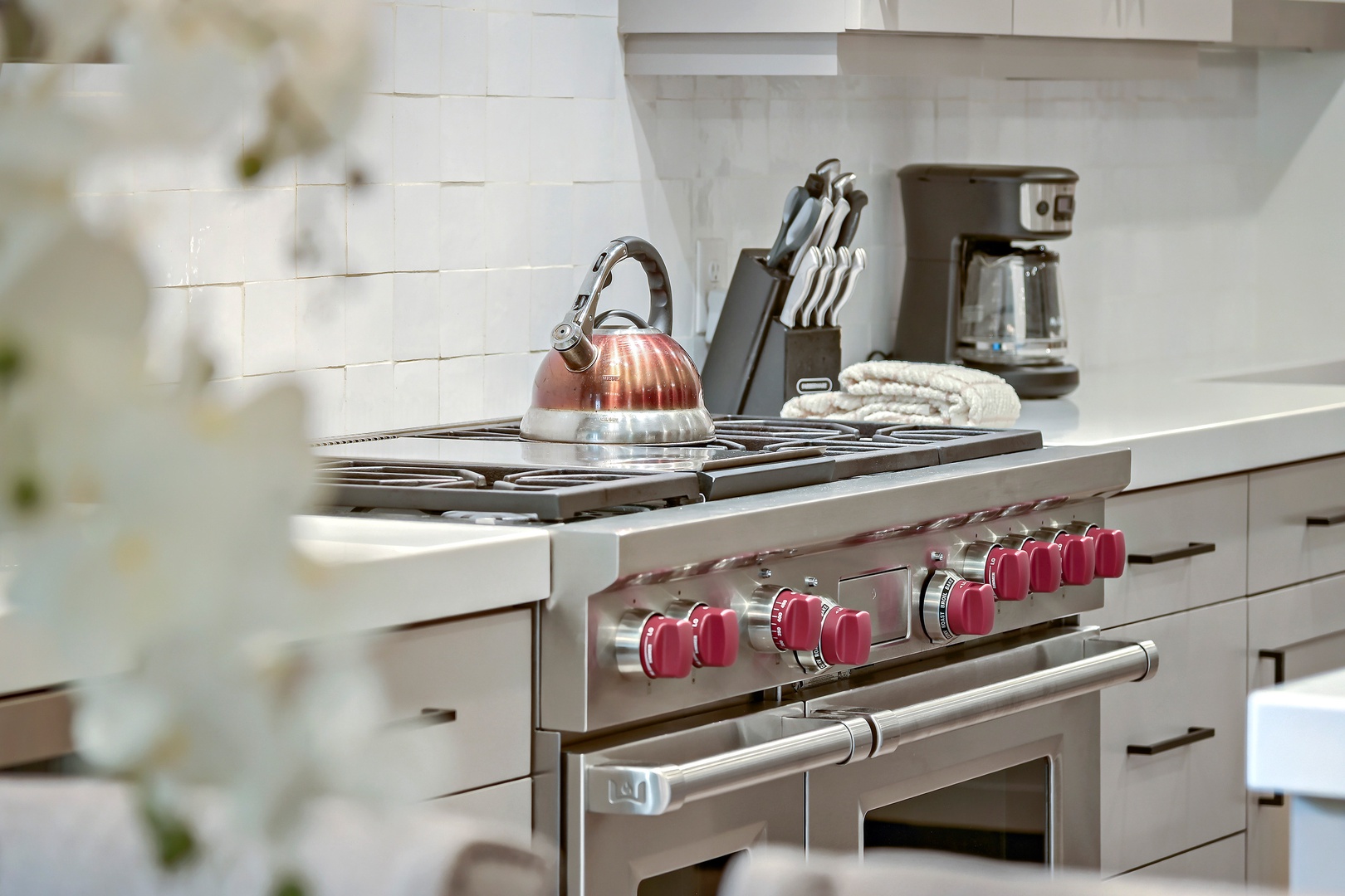 Your dream chef's kitchen awaits with a professional-grade stove, gleaming countertops, and all the essentials to whip up memorable meals during your stay.