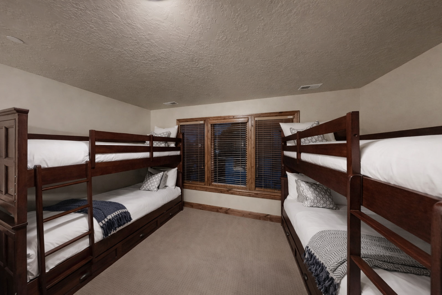 Your group sleeps soundly in this cozy bunk room with comfortable beds and soft linens for restful nights.