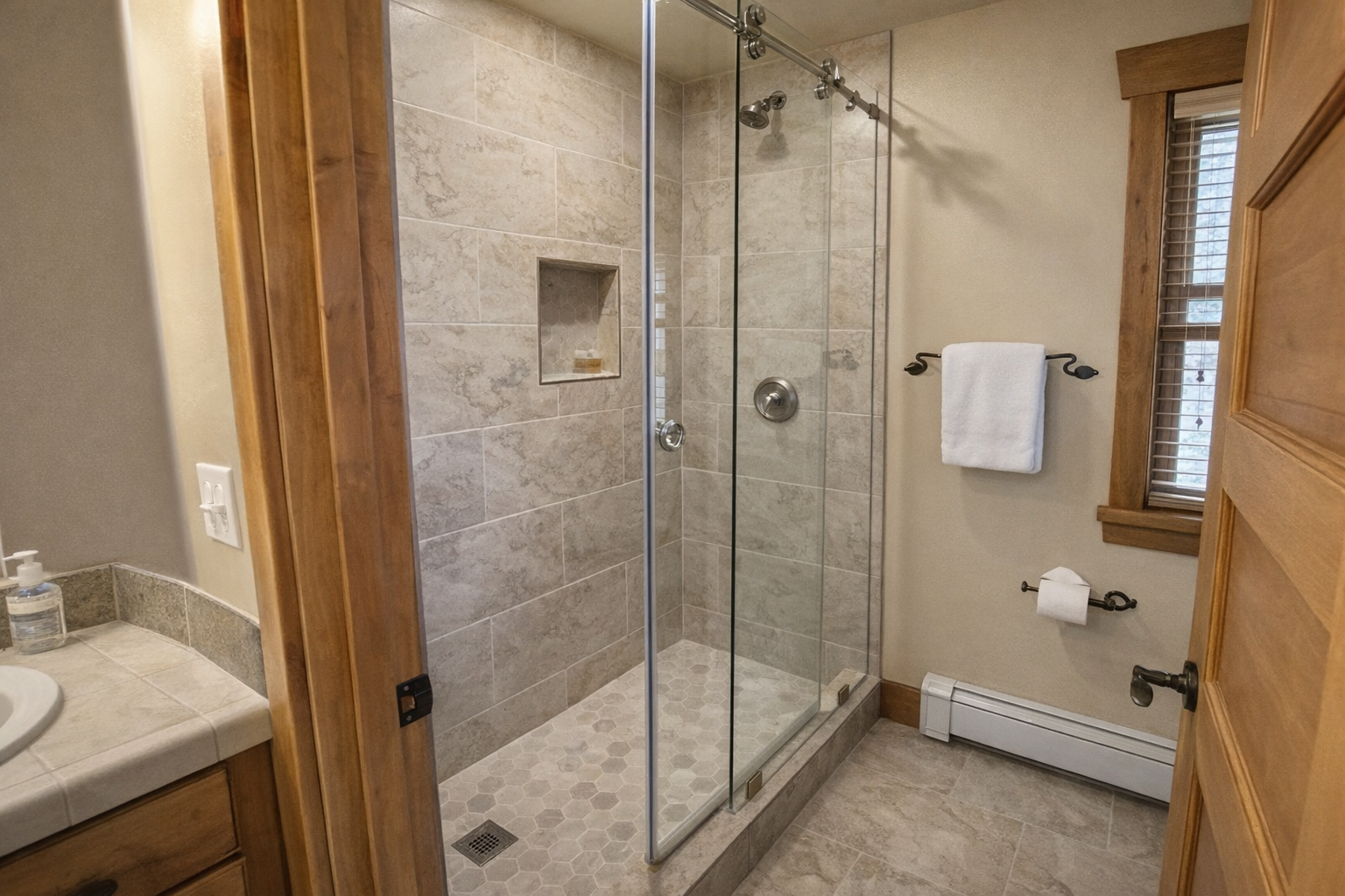 Relax in the large glass walk-in shower or enjoy the spacious wooden double vanity. It's the perfect spa-like retreat after exploring Park City.