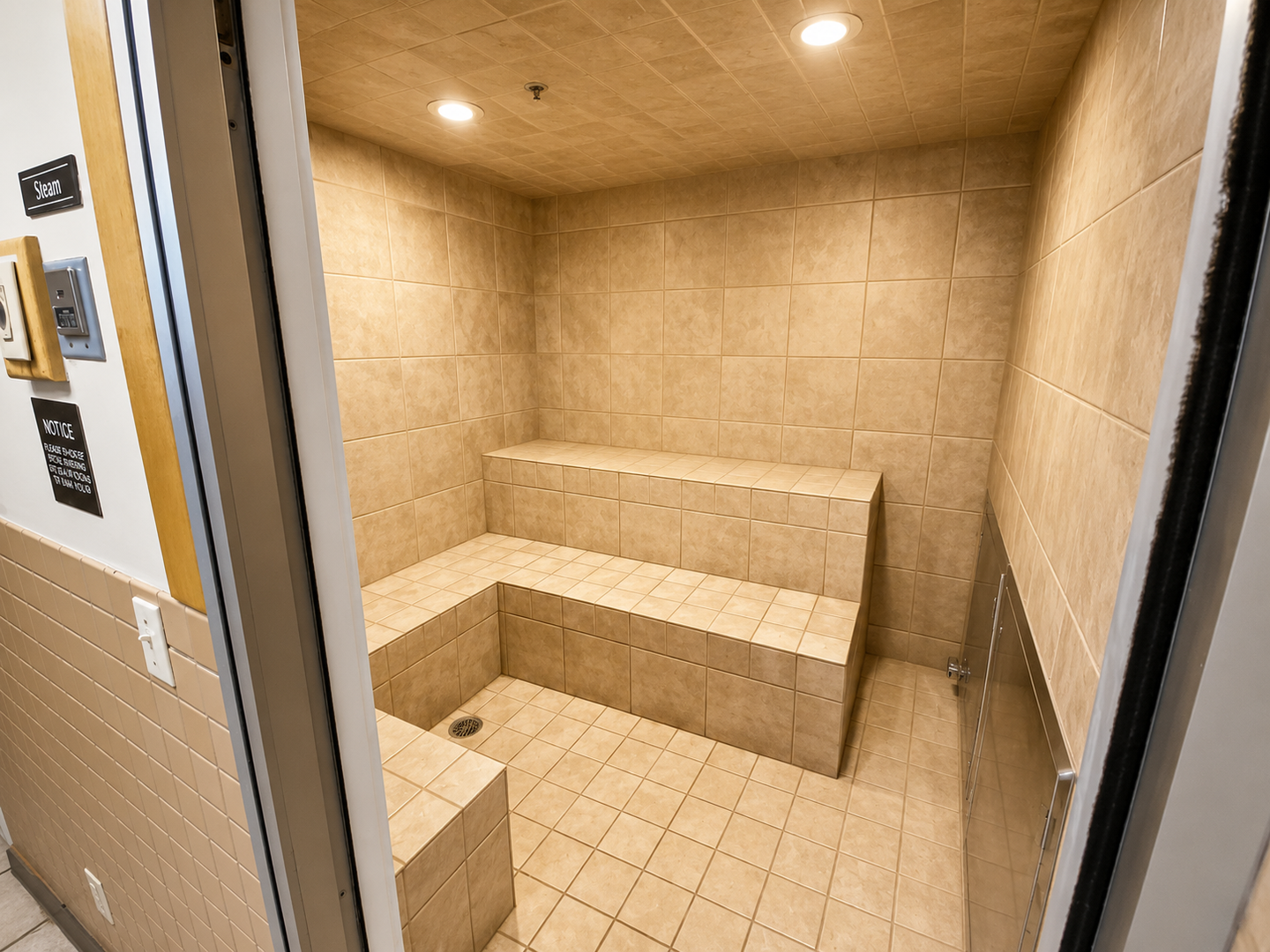 Step into the soothing warmth of your private steam room, where heated tile benches invite you to relax and rejuvenate after a long day of exploring.