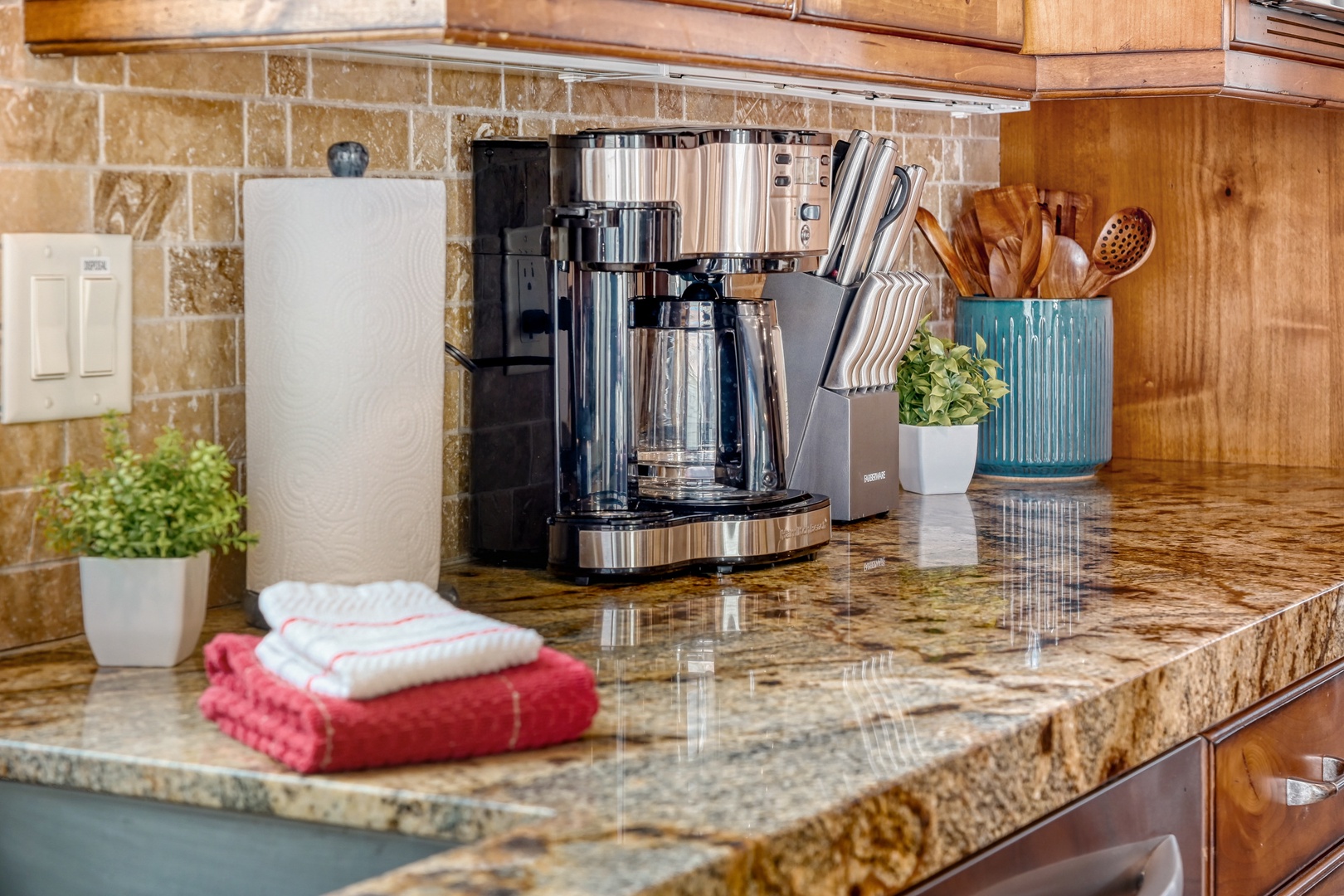 Wake up to fresh coffee brewing in your fully equipped kitchen, complete with granite countertops and quality appliances.