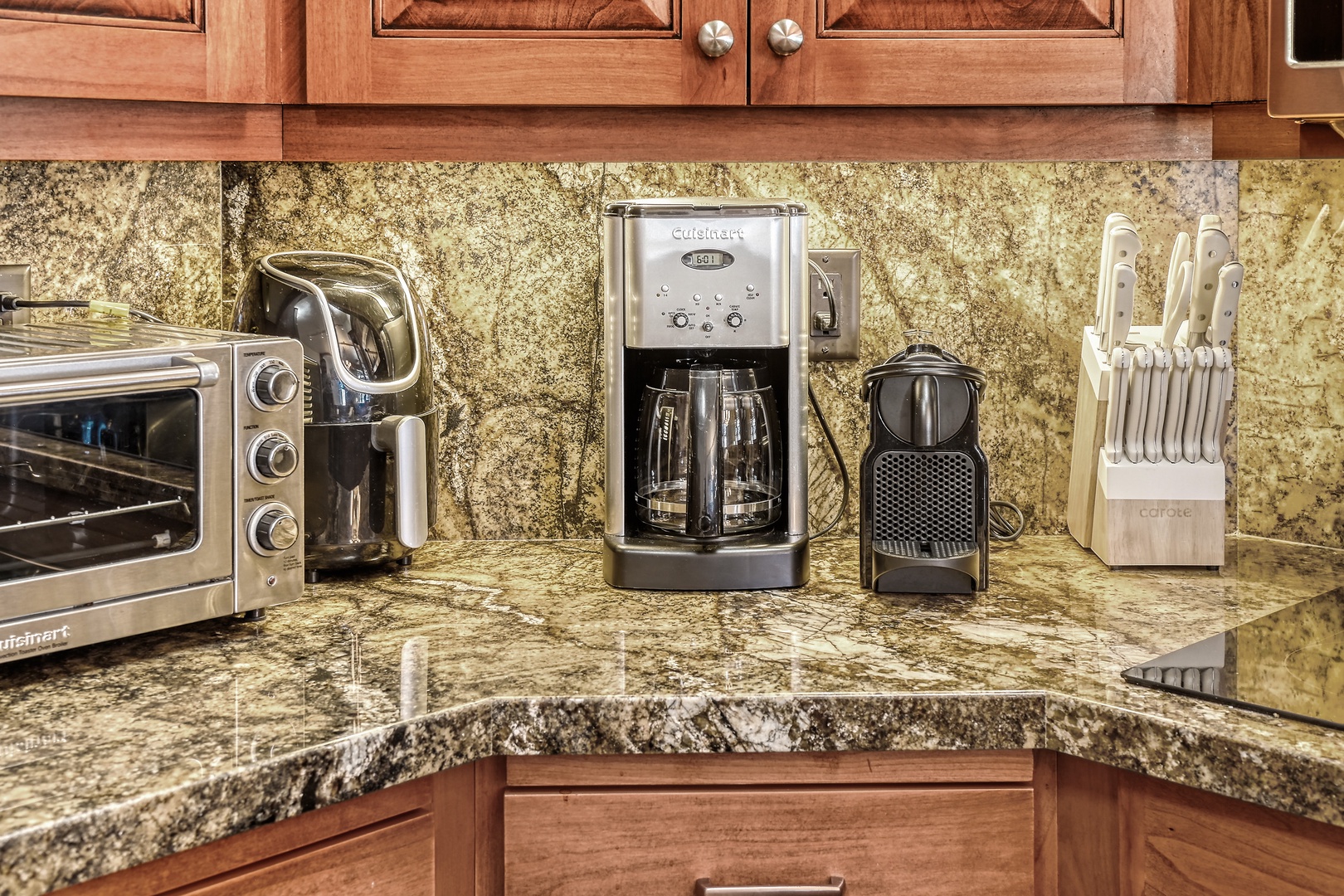 Your gourmet kitchen features premium appliances and granite counters, ready for your culinary adventures.