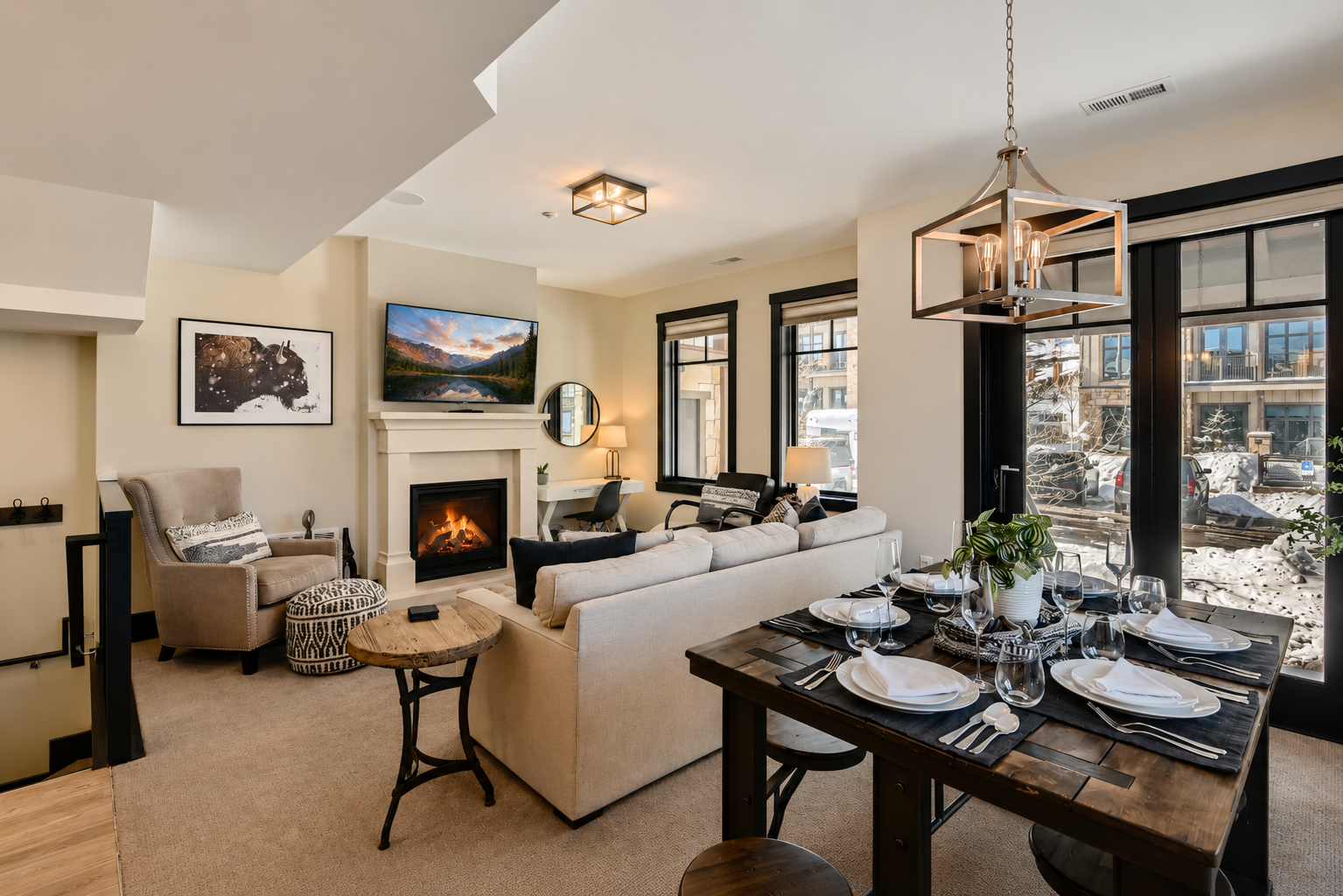 Cozy up by your crackling fireplace while winter views frame your elegant retreat, complete with plush seating and modern comforts.