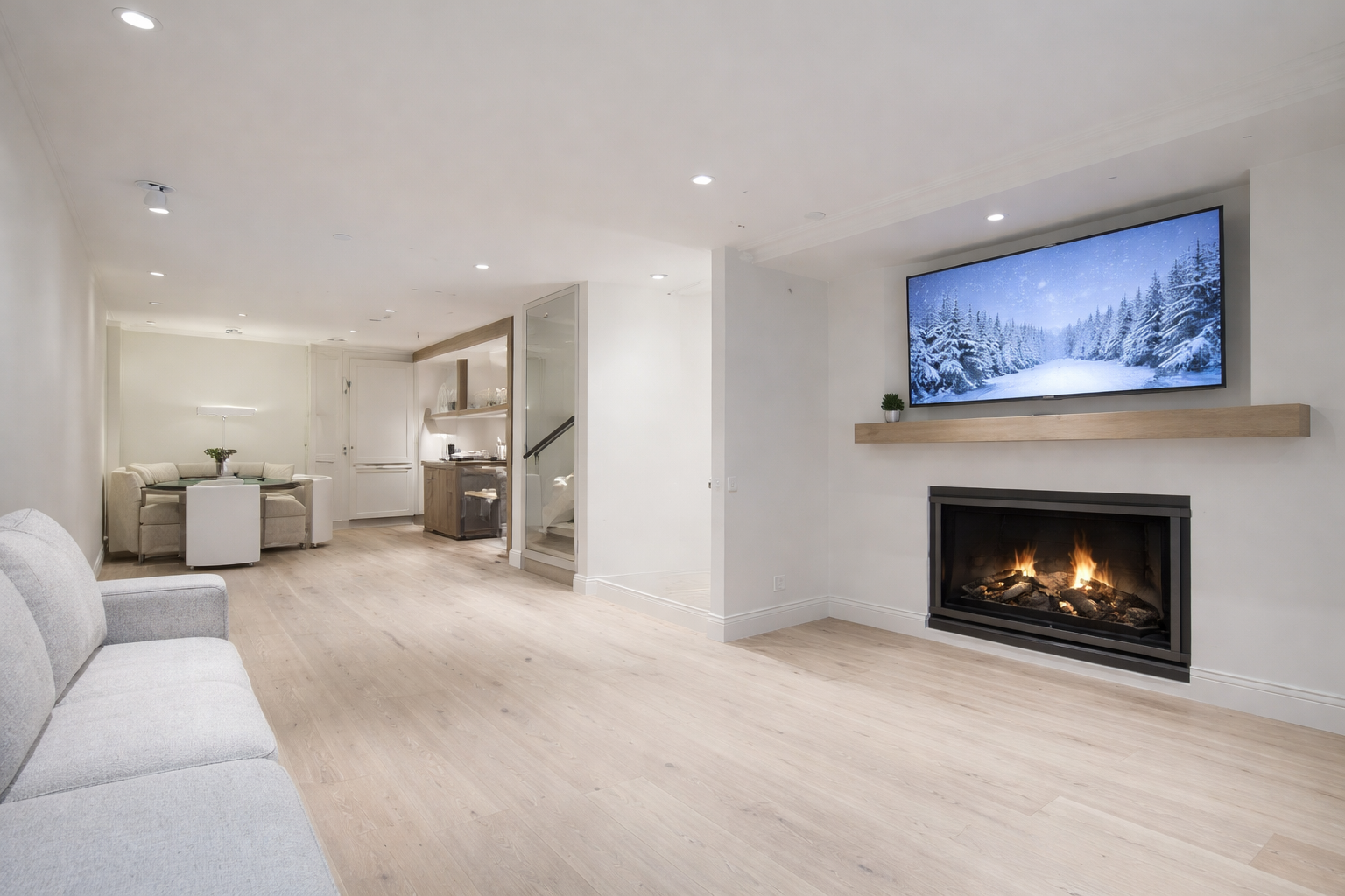 Cozy up by your private fireplace while enjoying modern amenities and open-plan comfort in this stylish retreat.