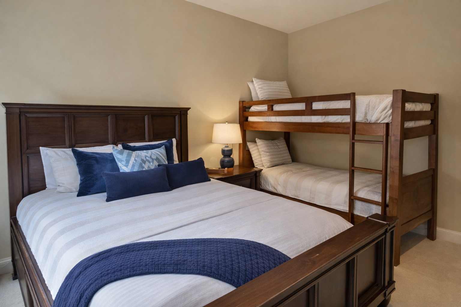 Your spacious bedroom offers comfort for the whole family with a plush king bed and fun bunk beds, plus an ensuite bathroom.