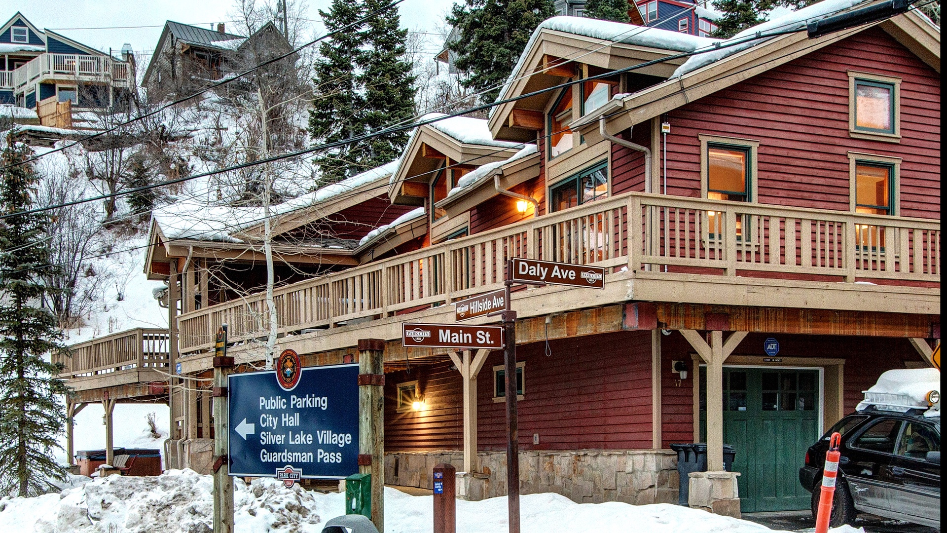 Charming ski town building with rustic mountain architecture, snow-covered roofs, and cozy winter atmosphere in historic village setting.
