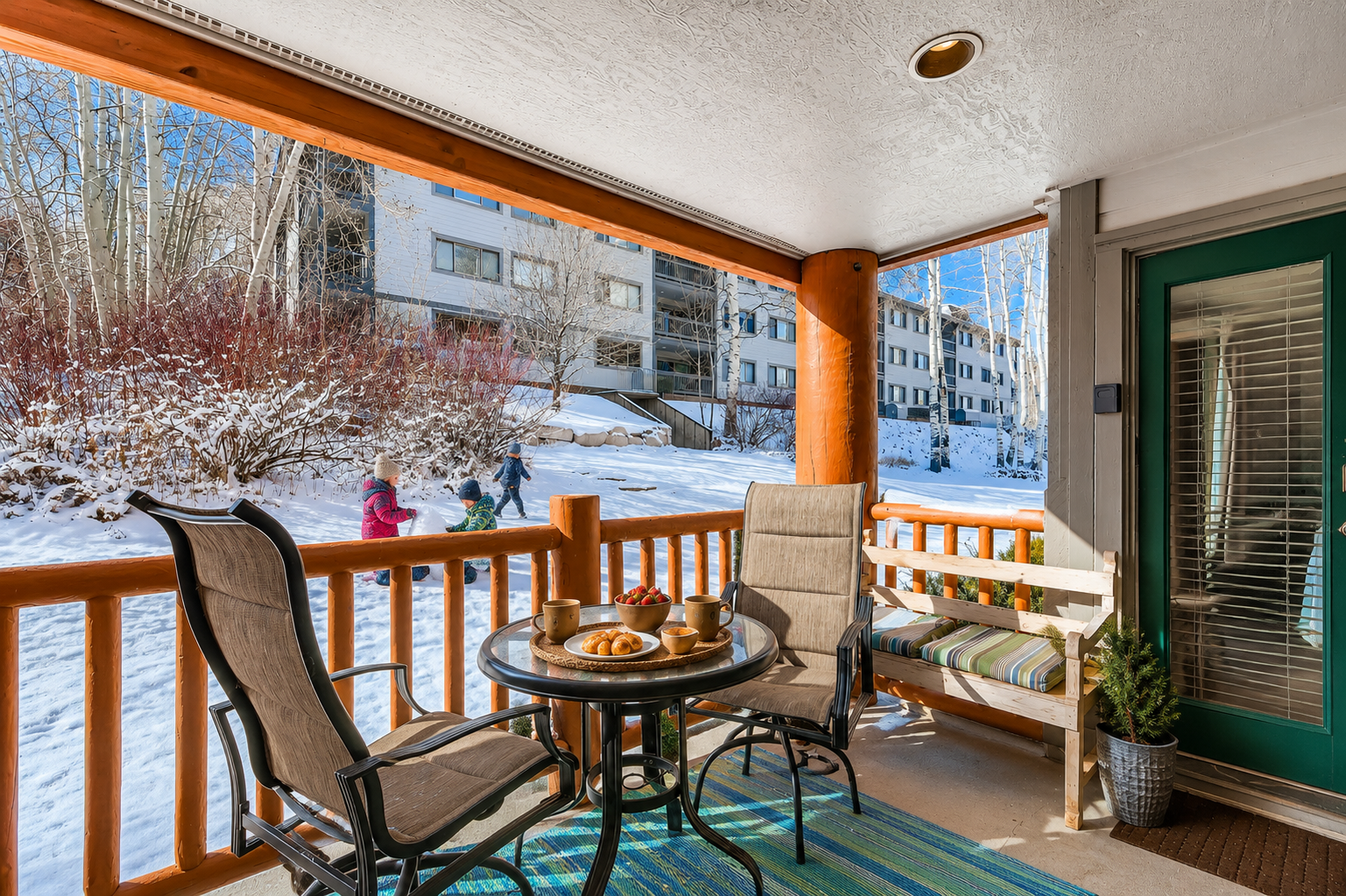 Step onto your private balcony and breathe in the crisp mountain air while savoring your morning coffee. Watch skiers glide by as you relax in comfortable seating, surrounded by snow-dusted trees and stunning winter scenery.