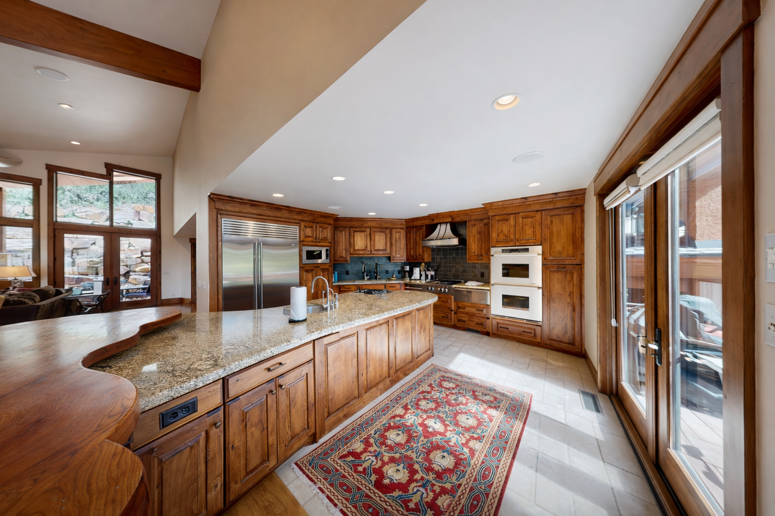 Whip up a feast in our chef's kitchen, complete with a large granite island, stainless steel appliances, and all the essentials for memorable meals.