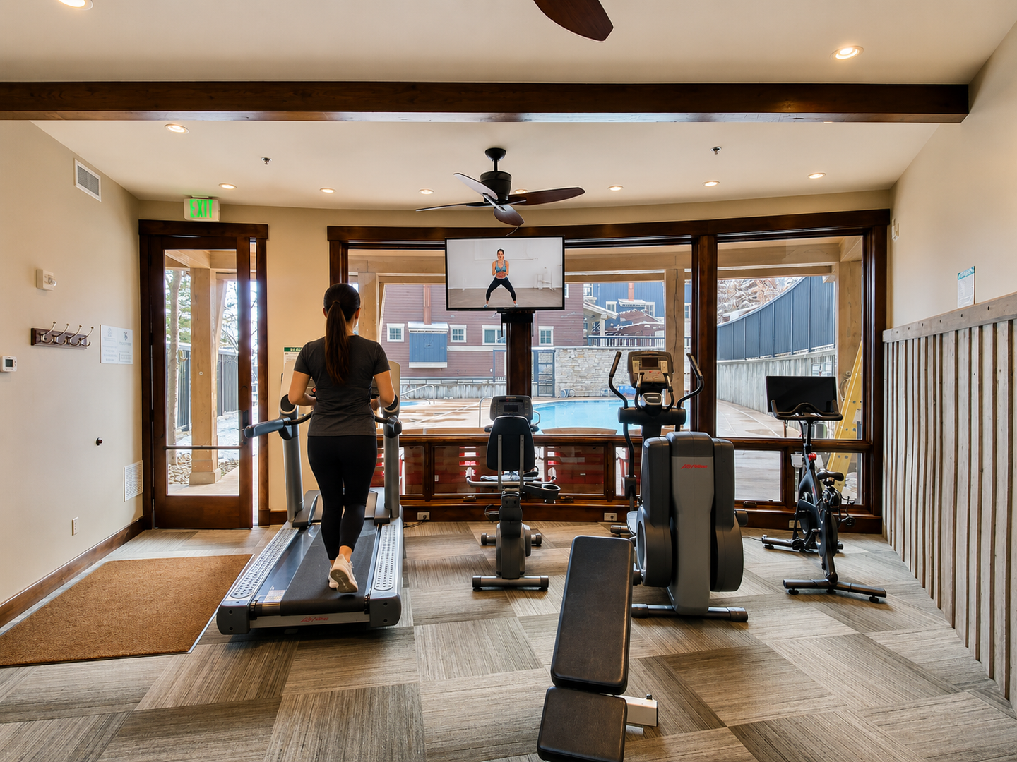 Stay active in a bright fitness center with treadmills, stationary bikes, weight benches, and guided virtual classes on the big screen.