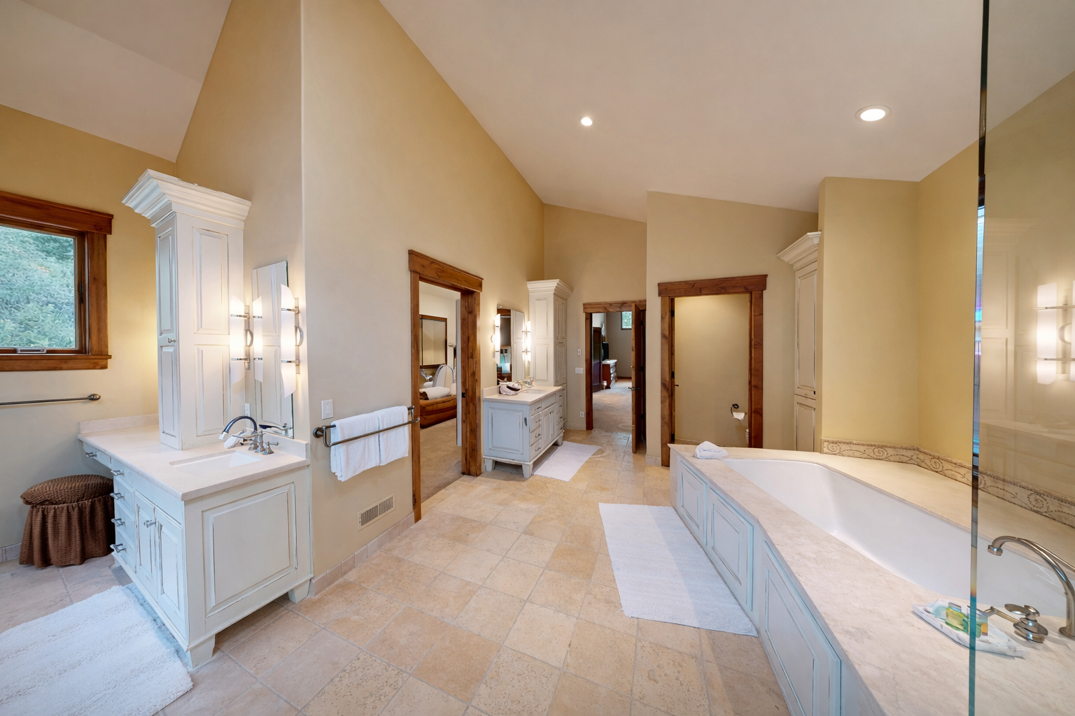 Indulge in your private spa-like master bathroom with elegant dual vanities, soaking tub, and luxurious finishes for ultimate relaxation.