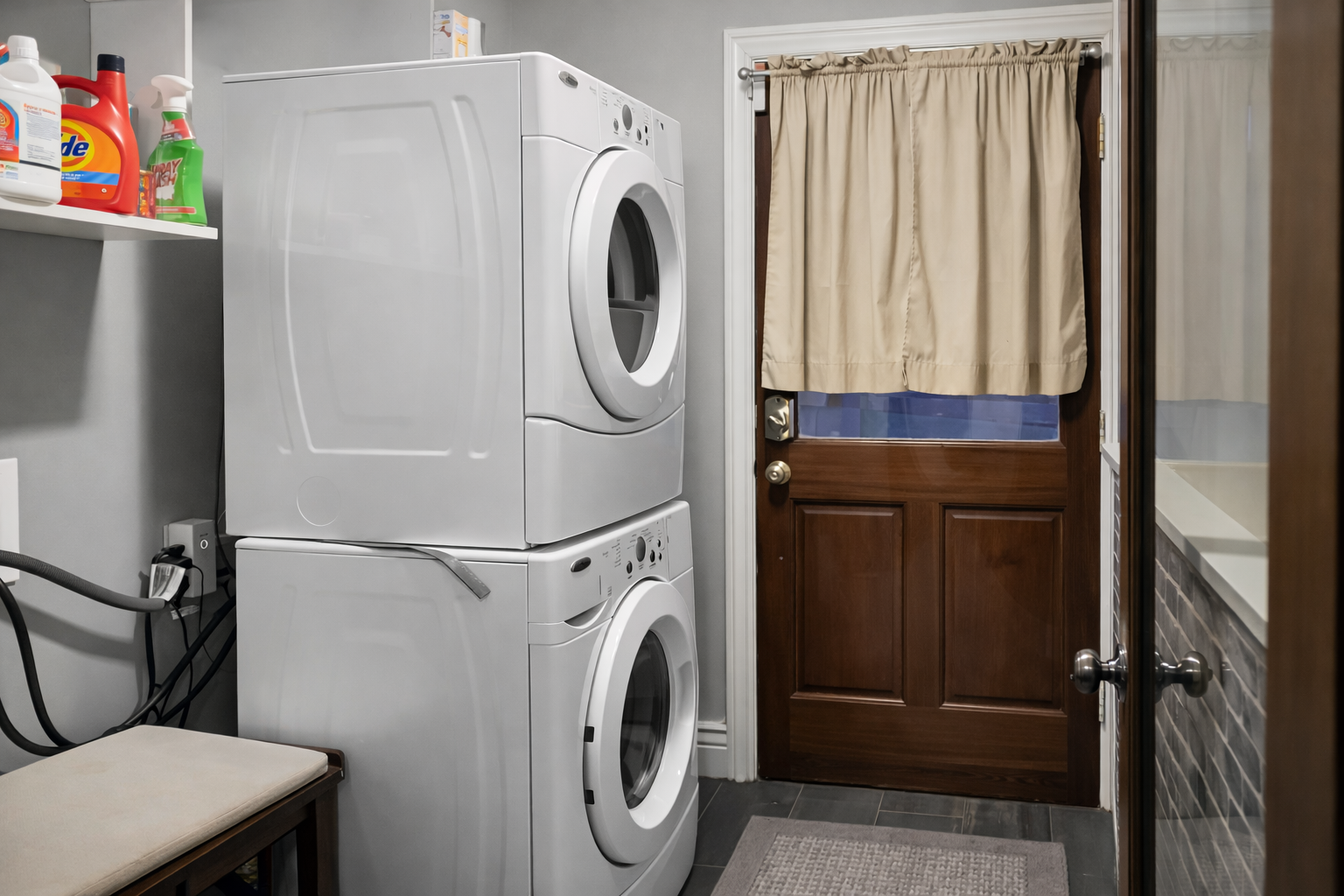 Your laundry is a breeze with this dedicated space featuring full-sized washer and dryer, plus storage for all your supplies.