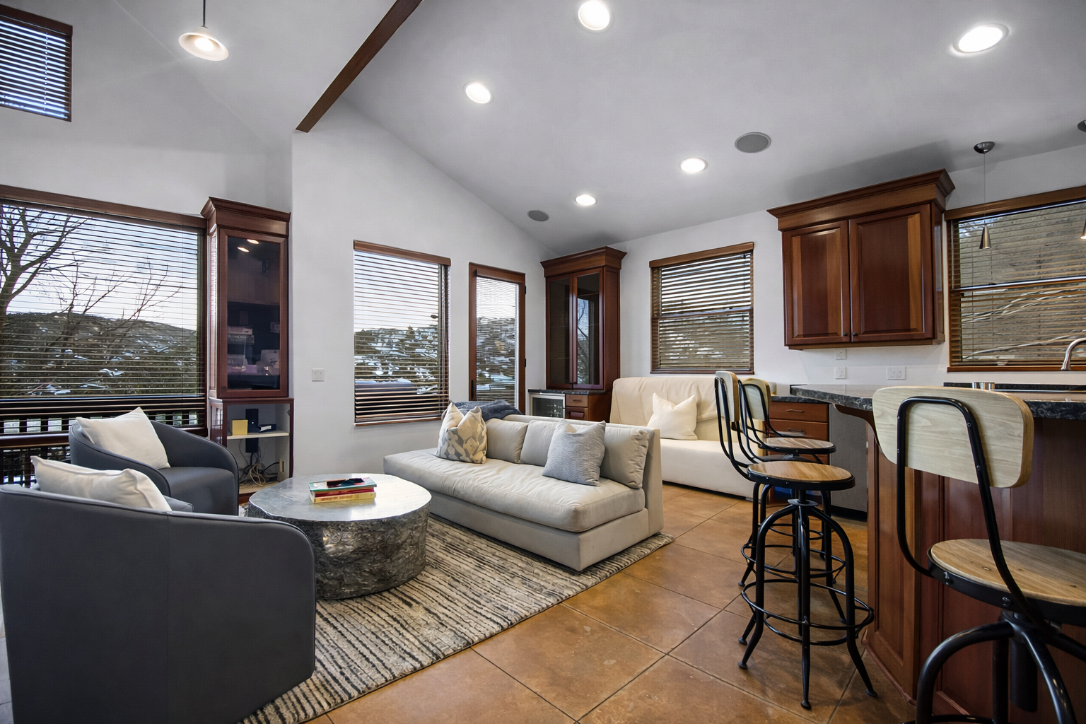 Unwind in your spacious open-concept living area where modern comfort meets rustic charm, complete with a fully equipped kitchen for home-cooked meals. Unit A