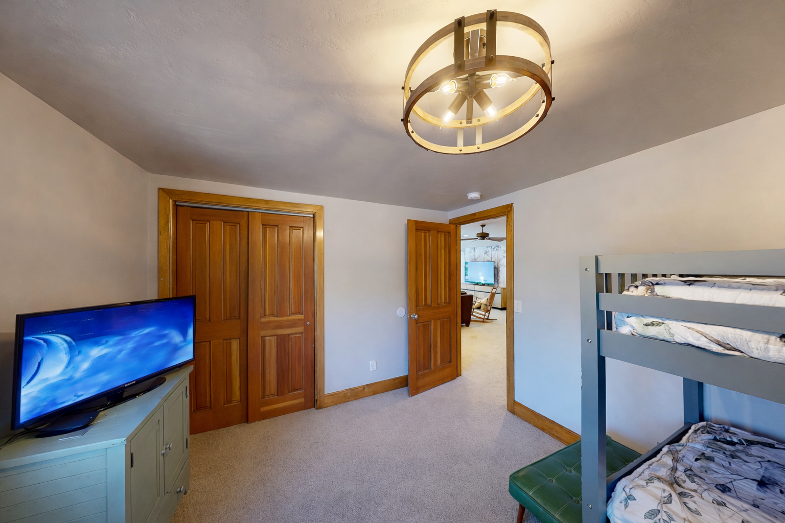 Your kids will love this cozy bunk room with entertainment ready for movie nights and plenty of space to play and relax together.