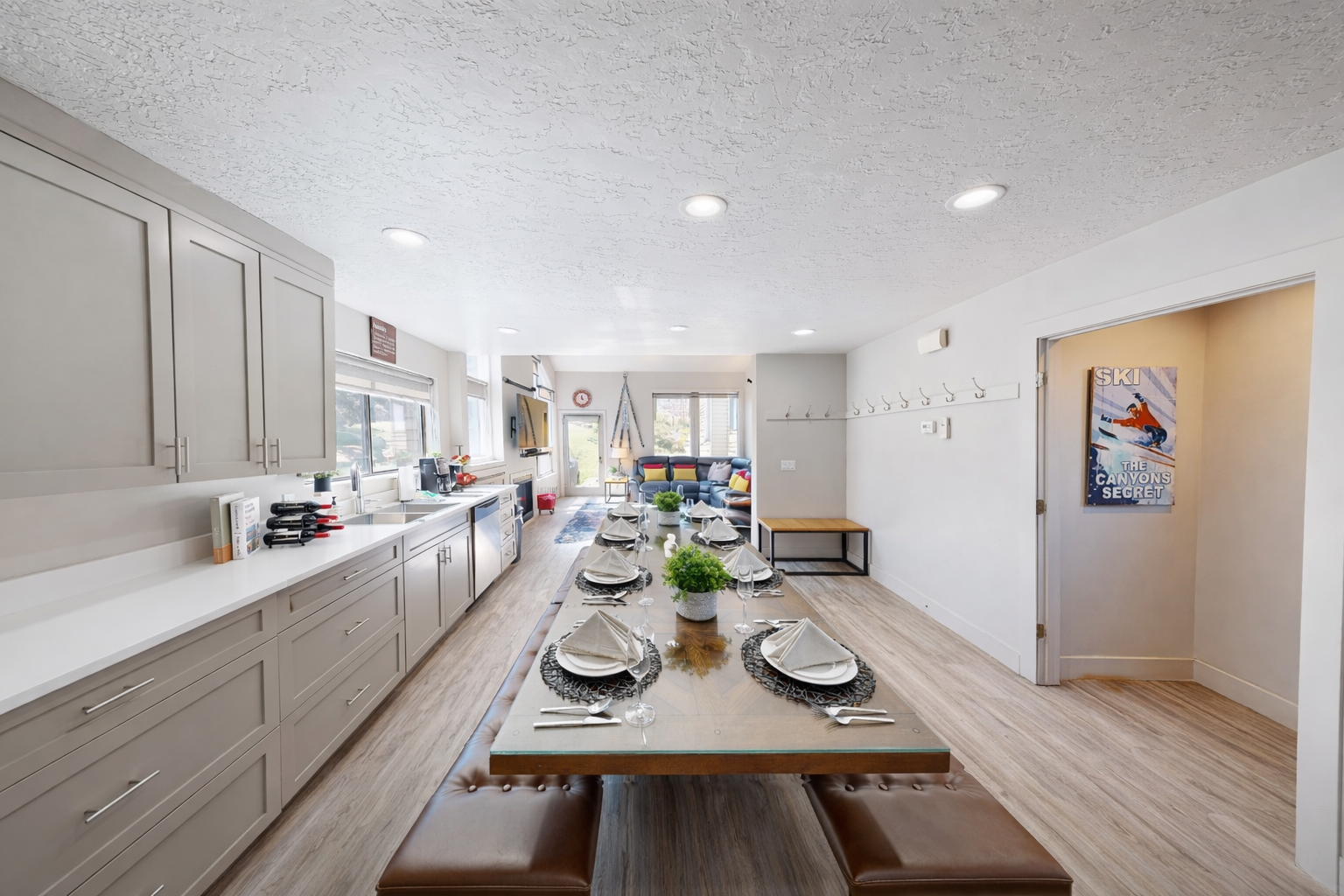 Your spacious kitchen and dining area features modern appliances, elegant table settings, and an open layout perfect for memorable meals together.