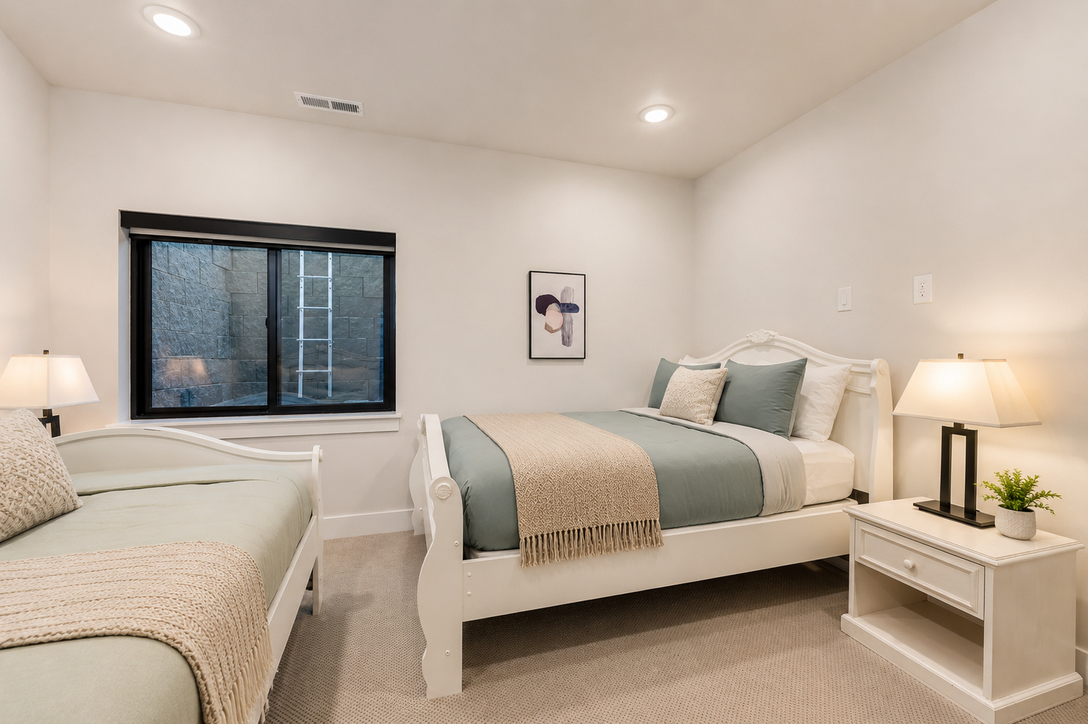 Rest easy in this serene bedroom with soft sage tones and plush bedding. Two comfortable beds ensure everyone sleeps soundly after a day of exploration.