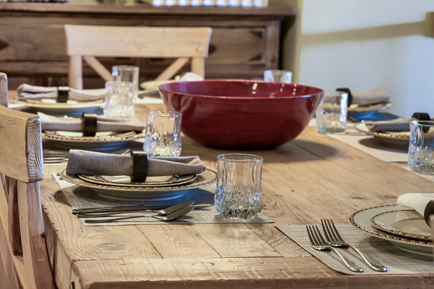 Large wooden table to fit all guests for a sit down dinner