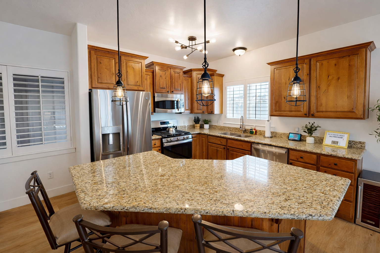 Cook like a pro in this gourmet kitchen featuring granite countertops, stainless steel appliances, and custom wood cabinetry