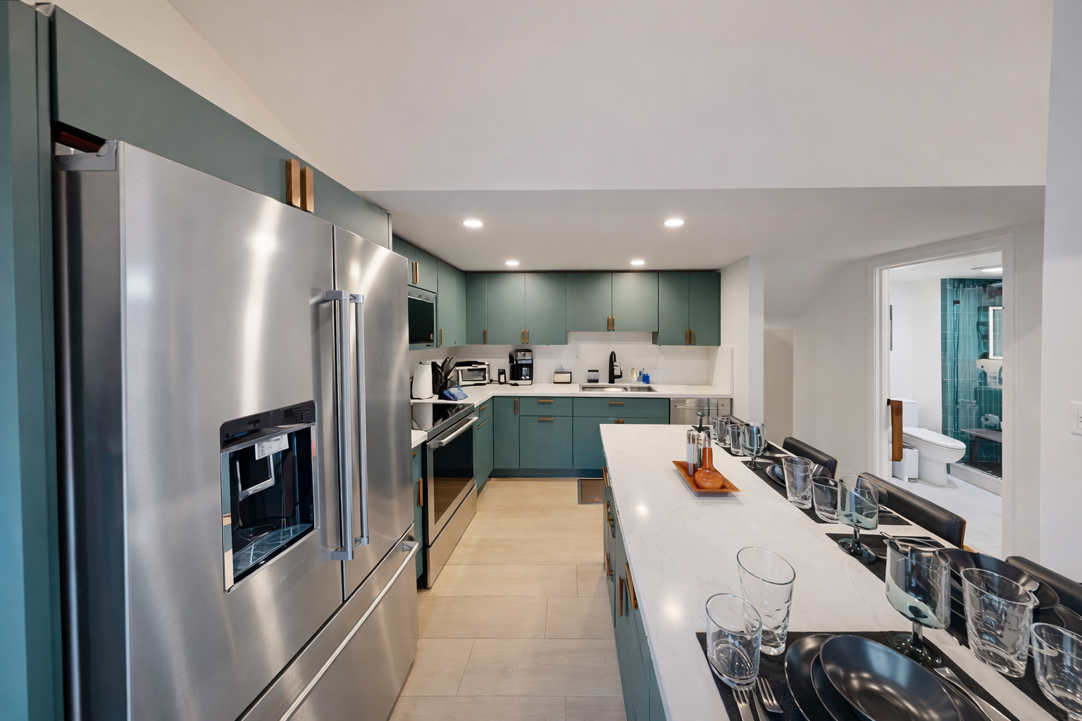 Your gourmet kitchen awaits with sleek appliances, marble countertops, and spacious layout perfect for preparing memorable meals during your stay.