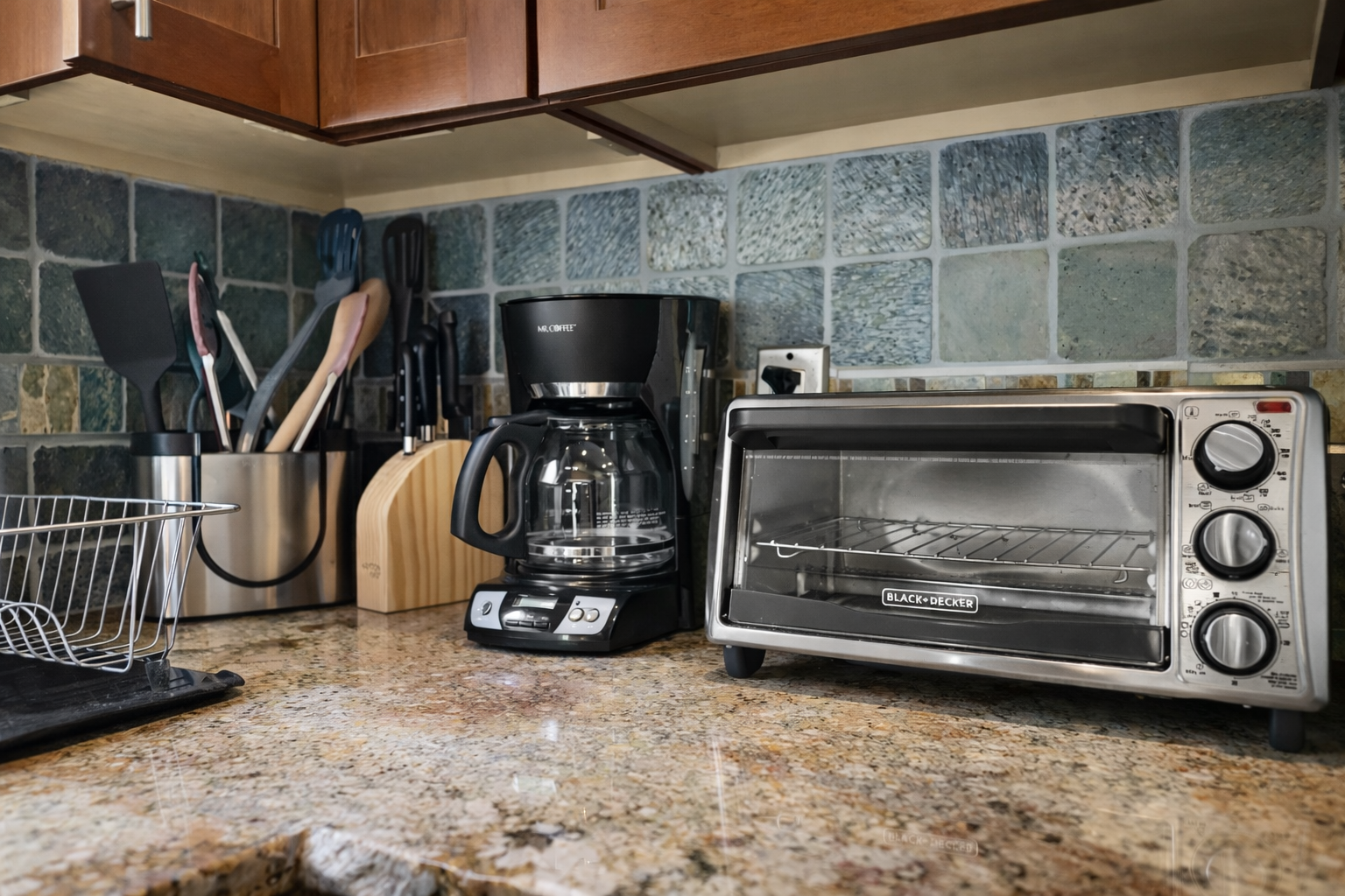 Your kitchen comes equipped with everything you need, including a coffee maker for your morning brew and toaster oven for quick meals.