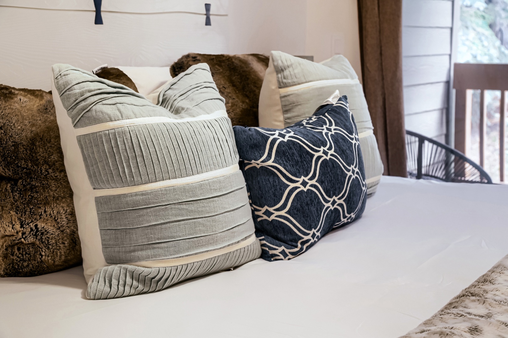 Sink into plush pillows and crisp linens after a day exploring. Your private balcony invites morning coffee and evening breezes just steps from your bed.