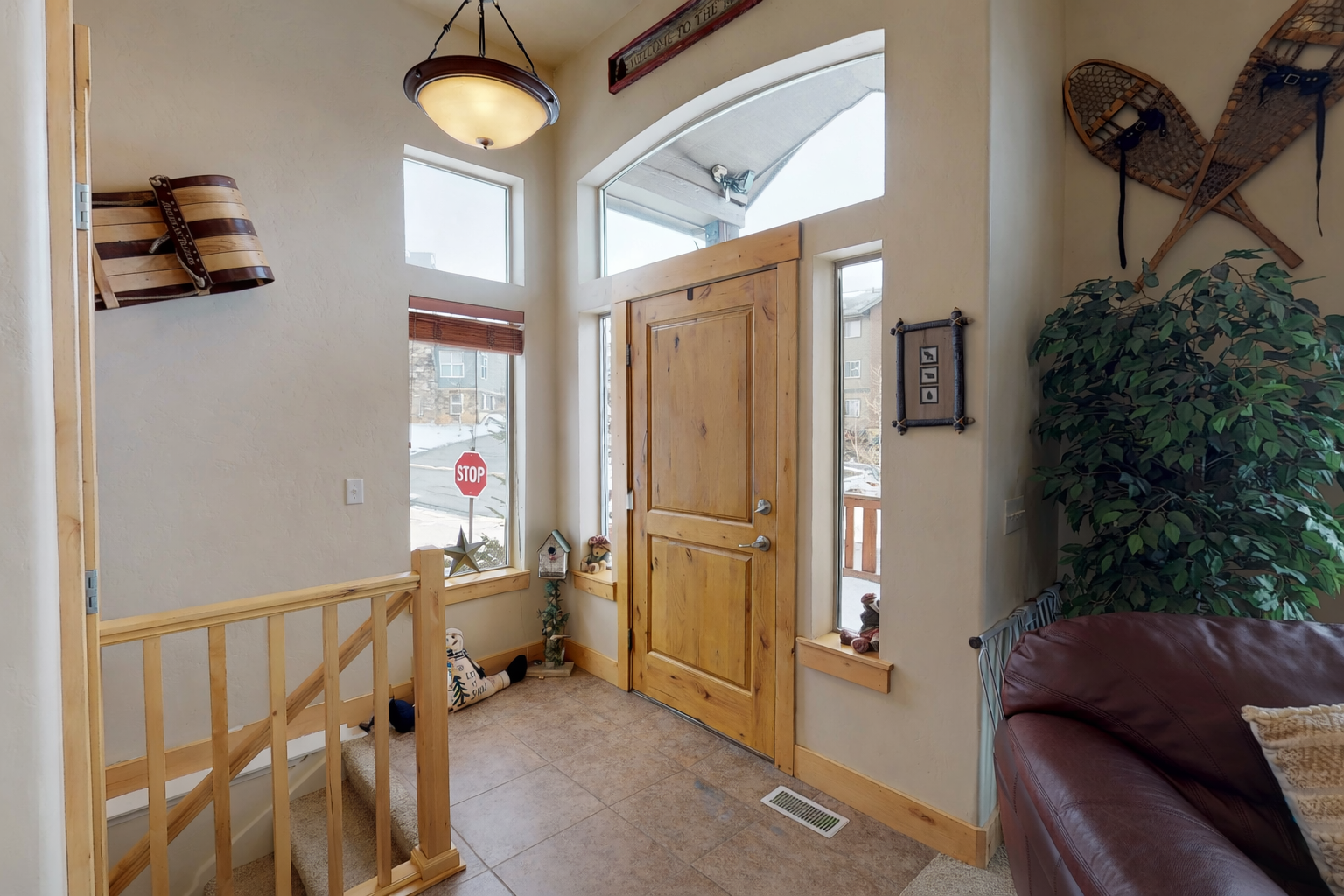 Step into your welcoming entryway with rustic charm and warm wood accents.