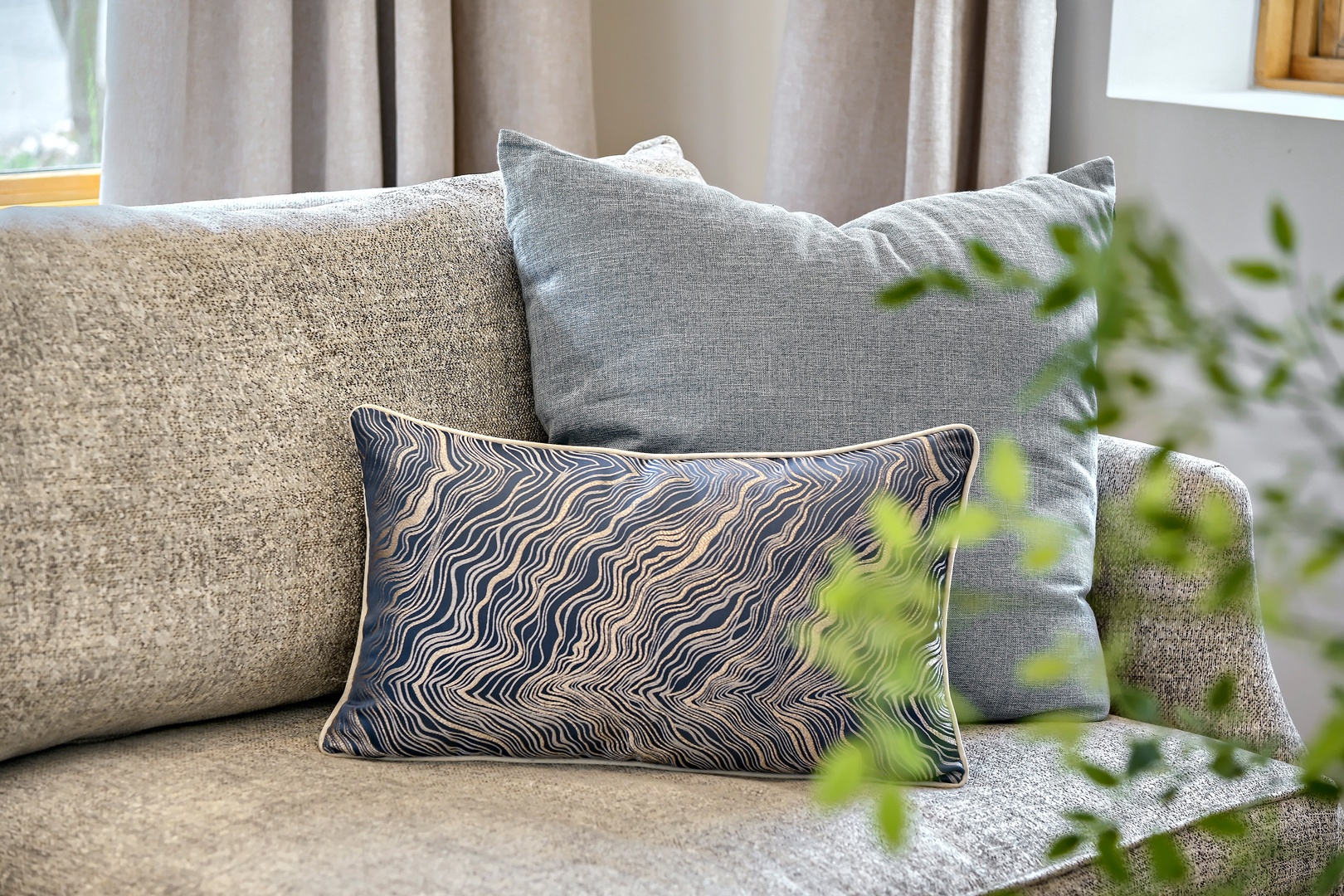 Sink into plush comfort on this inviting sofa, where soft textures and stylish cushions create your perfect spot to unwind after exploring.