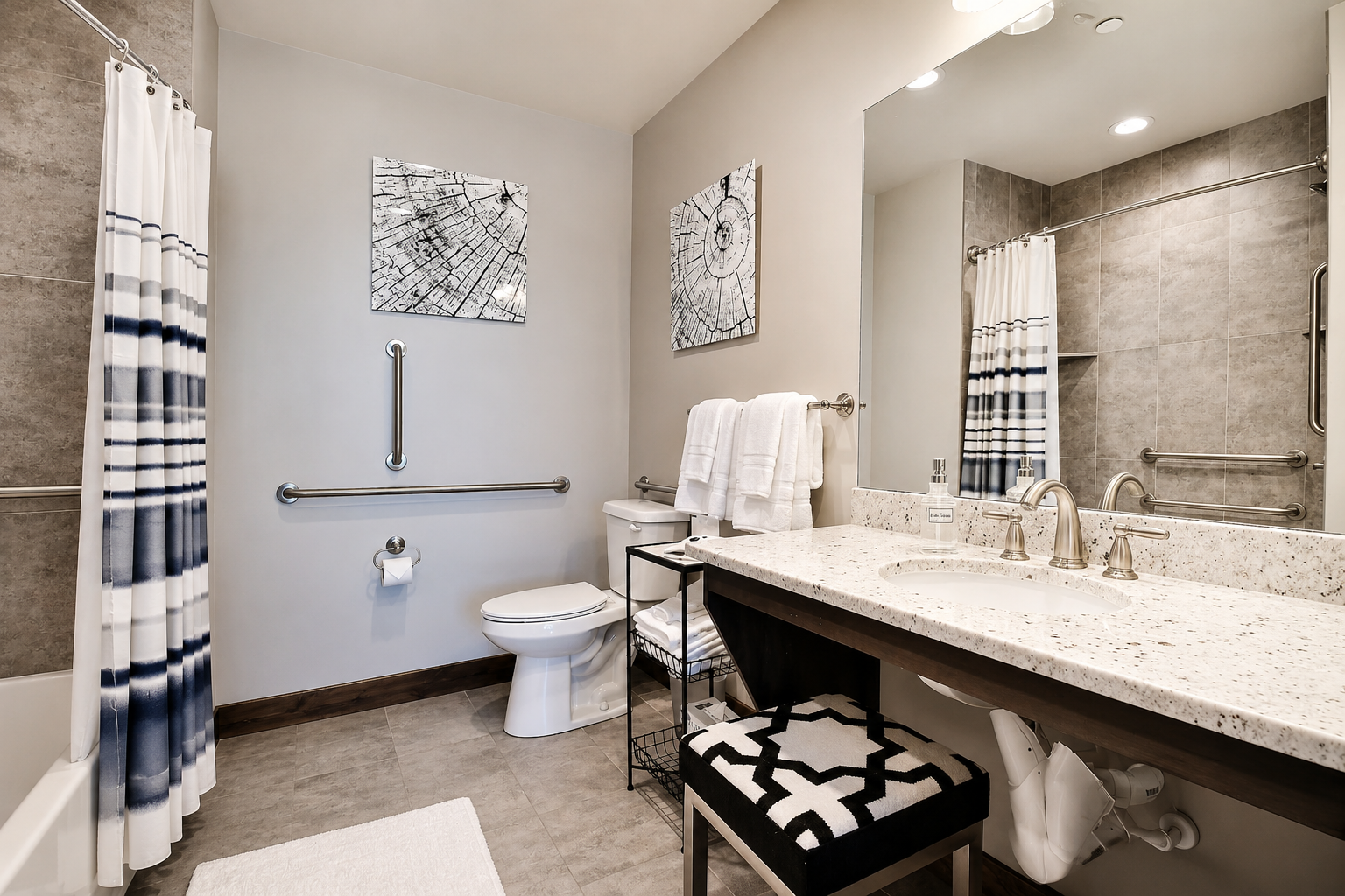 Your spacious bathroom features granite countertops, a luxurious soaking tub, and thoughtful accessibility features for ultimate comfort.