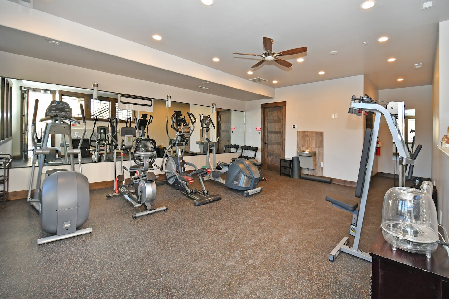 Stay active with your complete fitness center featuring cardio machines, strength equipment, and modern amenities to keep your workout routine on track.