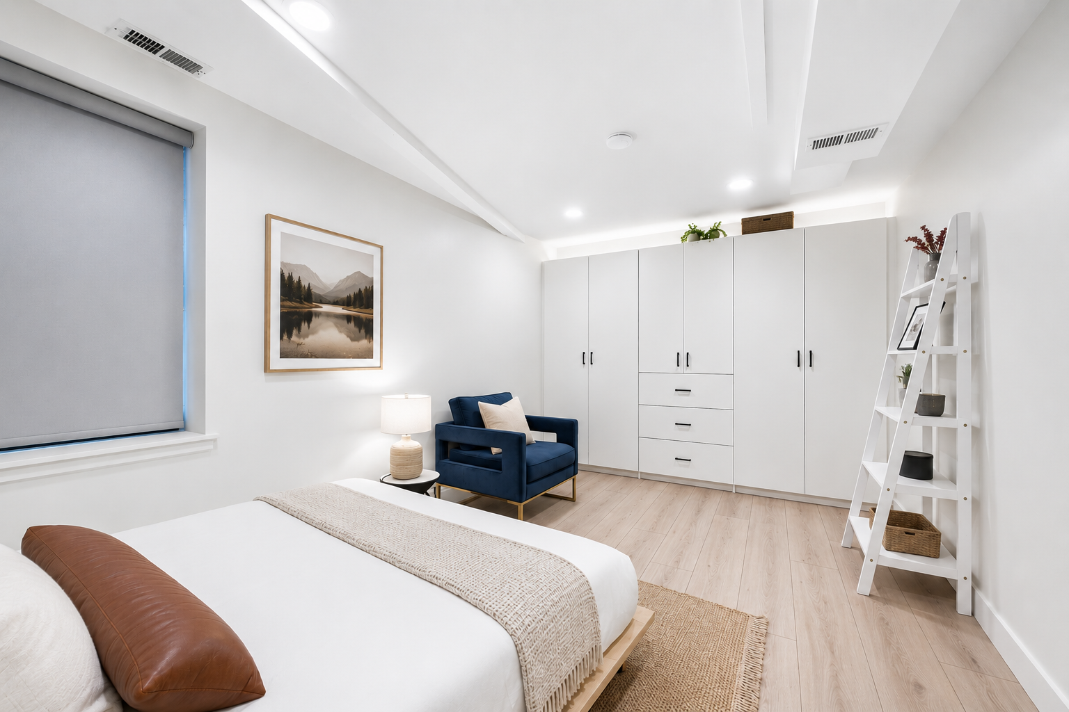 Your peaceful retreat awaits with soft linens, warm wood tones, and ample storage to feel right at home. Sink into the plush armchair, admire serene artwork, and enjoy a calming space designed for total relaxation.