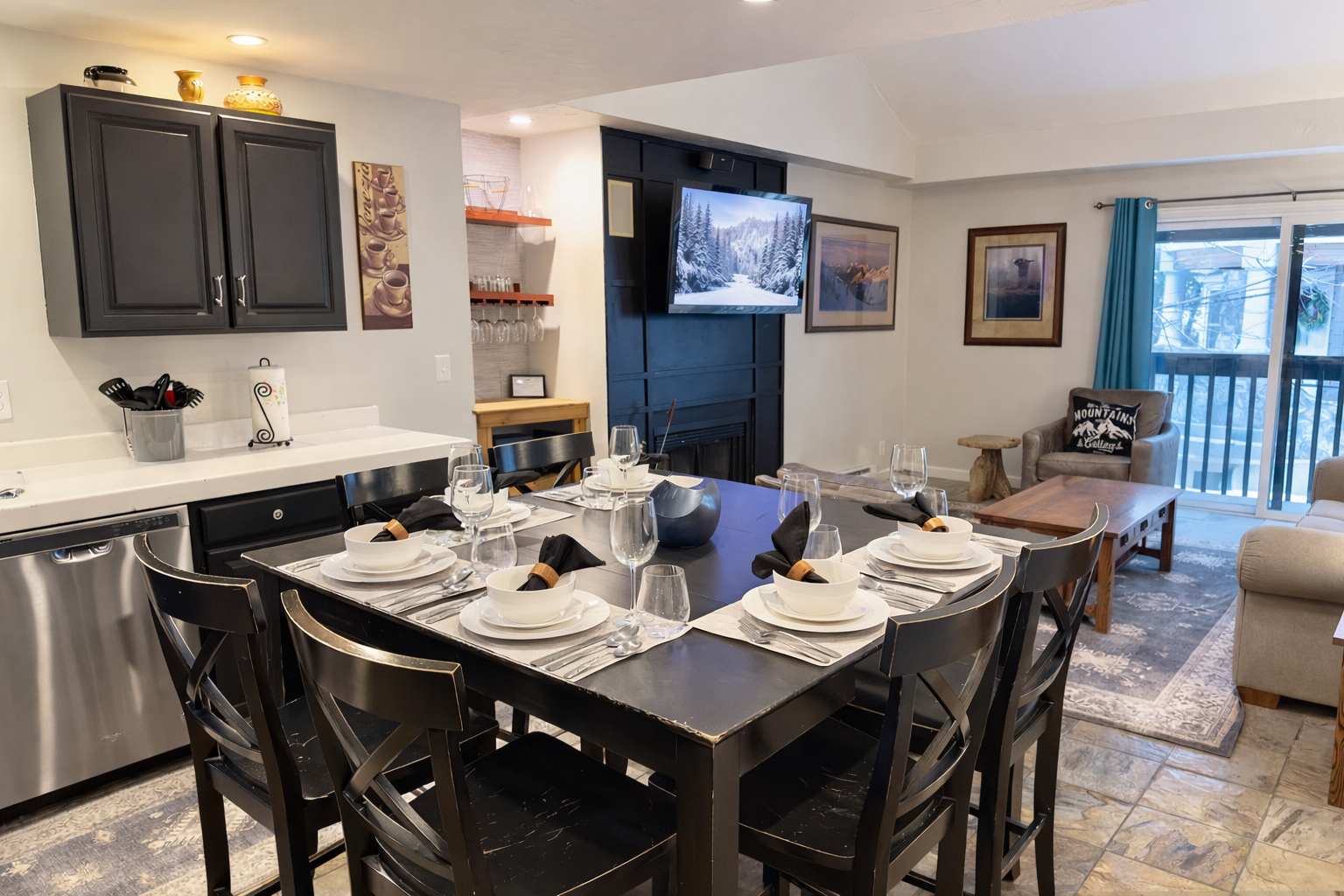 Your open-concept space seamlessly blends kitchen, dining, and living areas—perfect for memorable meals and cozy evenings by the fireplace.