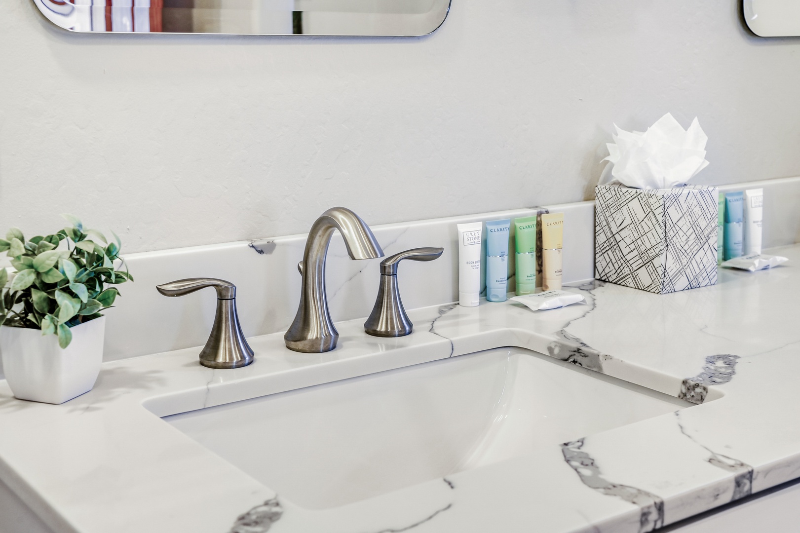 Step into your luxurious spa-like bathroom with elegant marble tiles and spacious walk-in shower for ultimate relaxation.