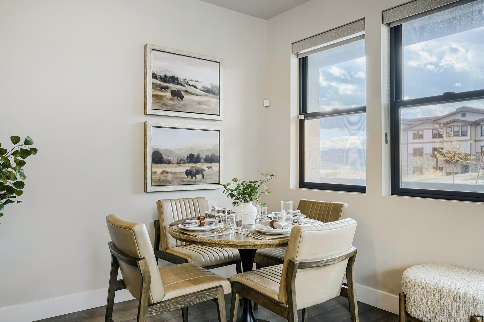 A bright dining nook awaits your meals together, with comfortable seating and natural light pouring through the windows to start your mornings right.