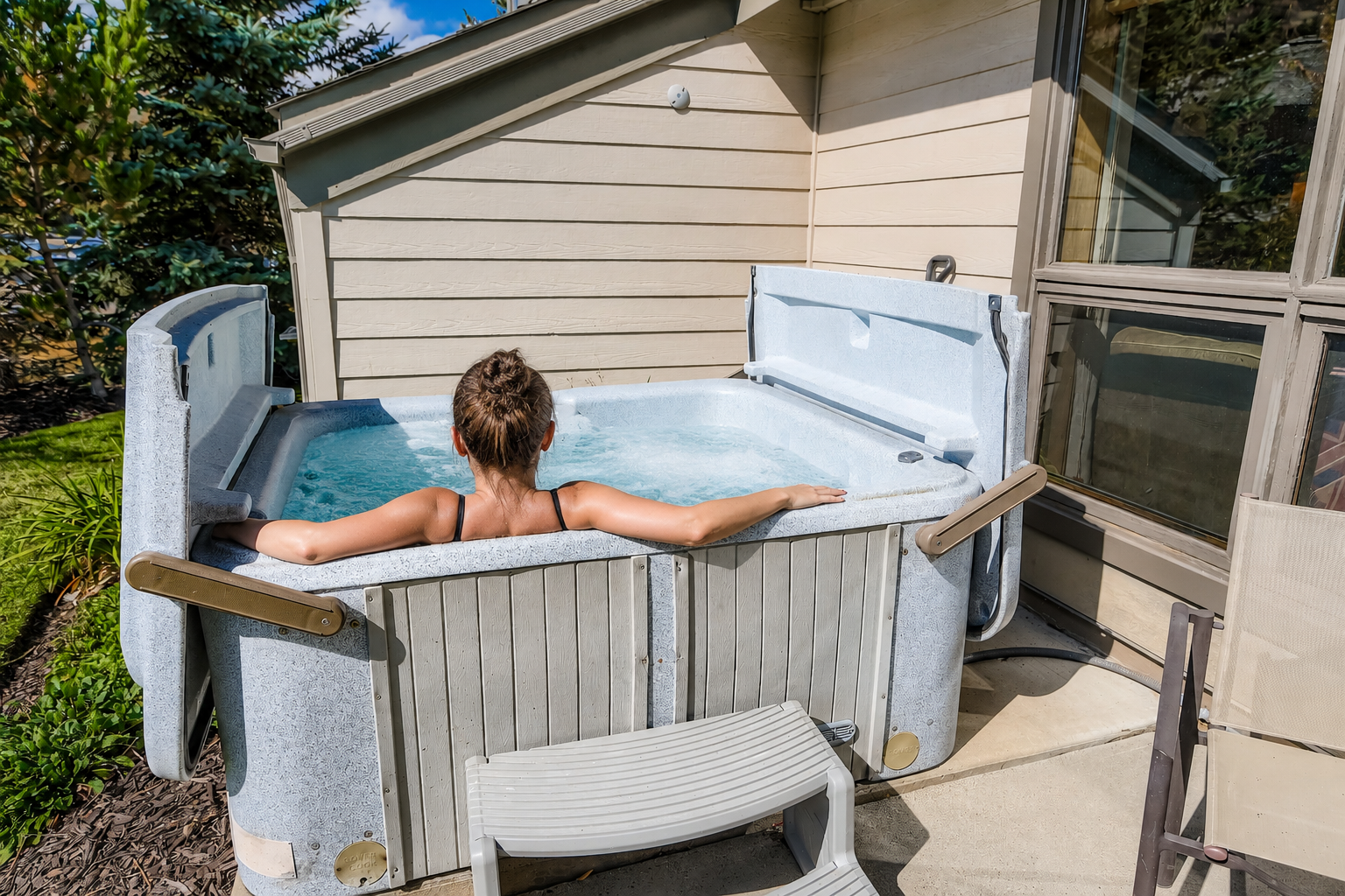 Slip into your own private hot tub, where warm bubbles and garden views create the perfect retreat after exploring nearby attractions.