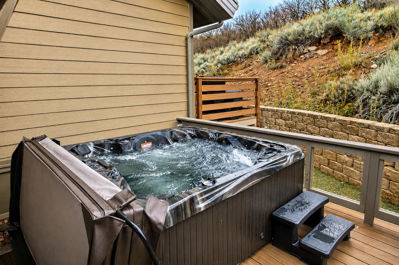Slip into your private hot tub and feel your cares melt away, surrounded by natural hillside beauty and crisp mountain air right on your deck.