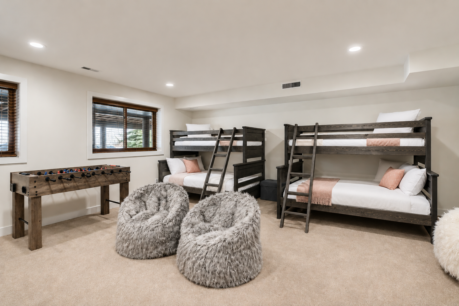 Enjoy our fun game room featuring comfortable bunk beds for shared sleeping and a foosball table for entertainment. The perfect spot for kids or groups to relax and play.