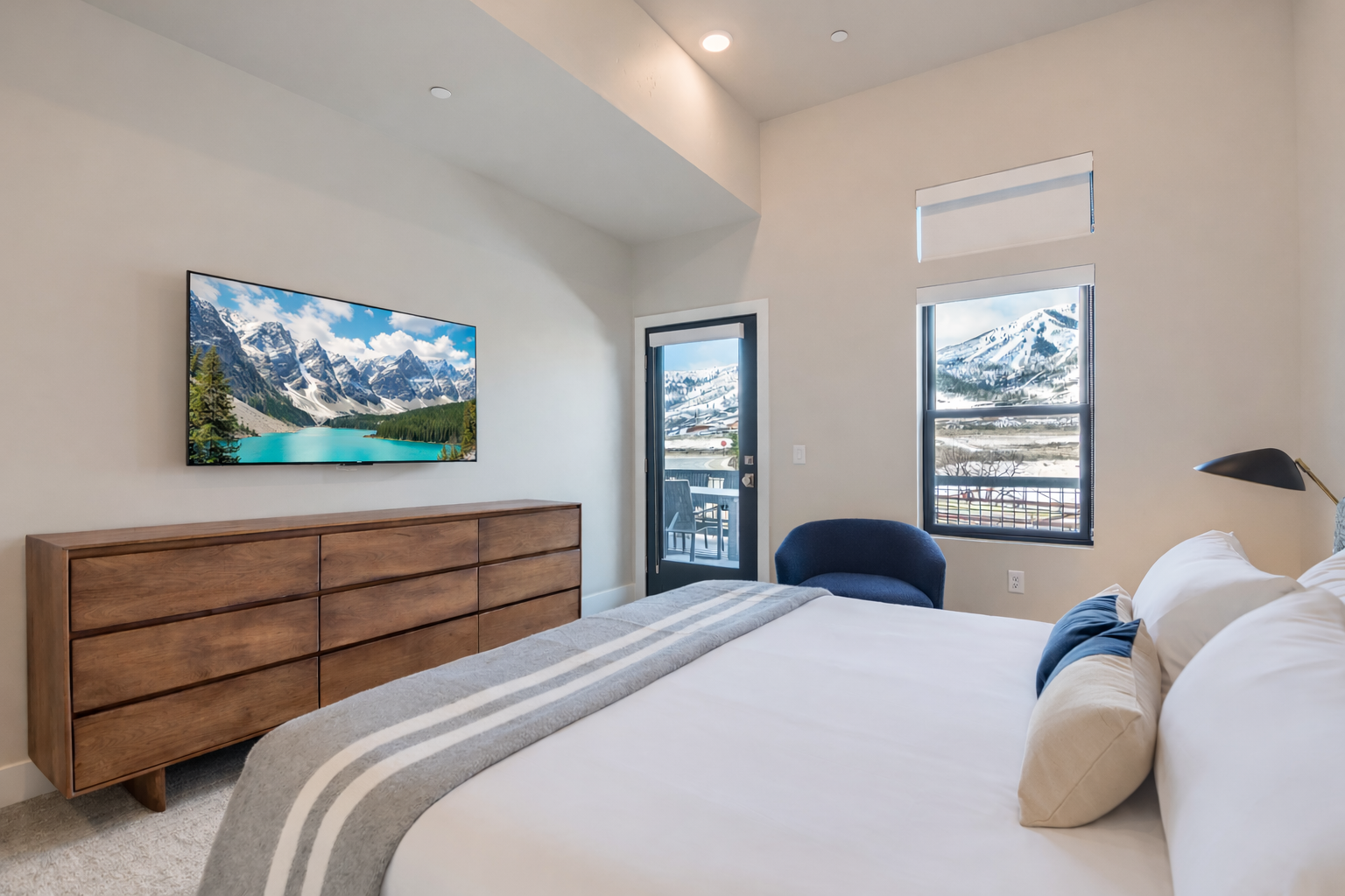 Drift off to sleep with breathtaking mountain views framing your window, creating your perfect alpine sanctuary.