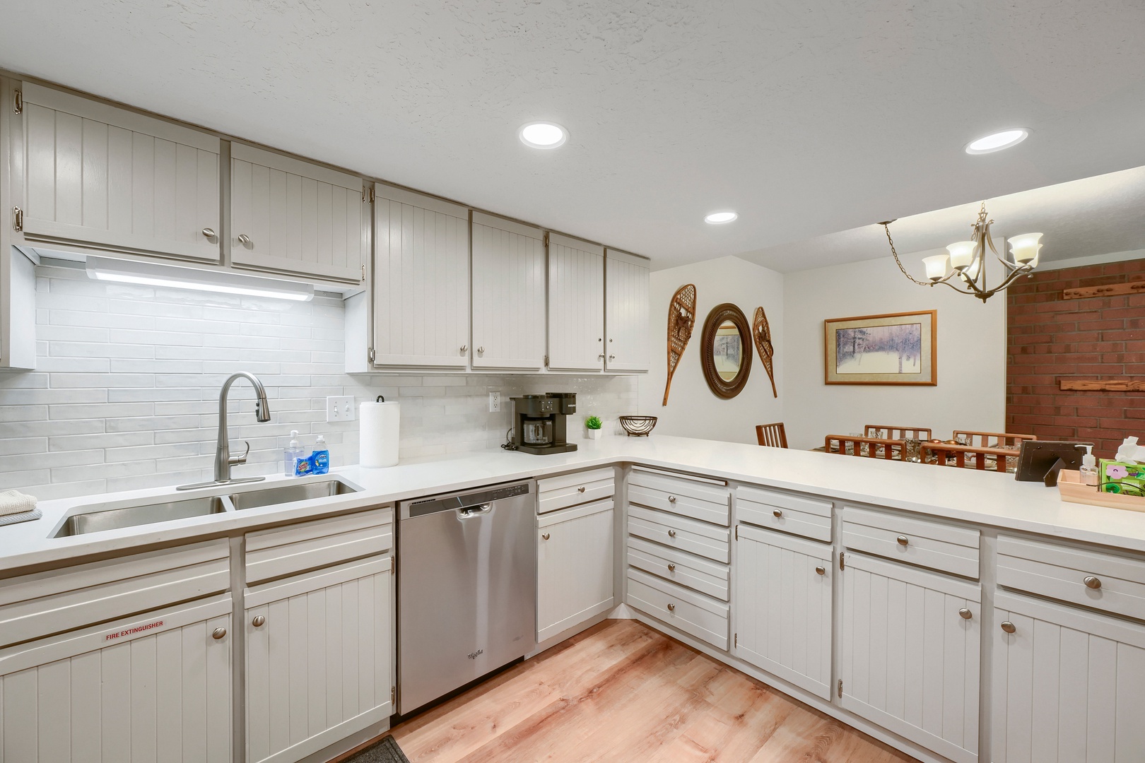 This bright, fully equipped kitchen gives you everything you need to whip up your favorite meals. With plenty of counter space, modern appliances, and a warm open design, it's the perfect spot to start your mornings or gather for cozy dinners.