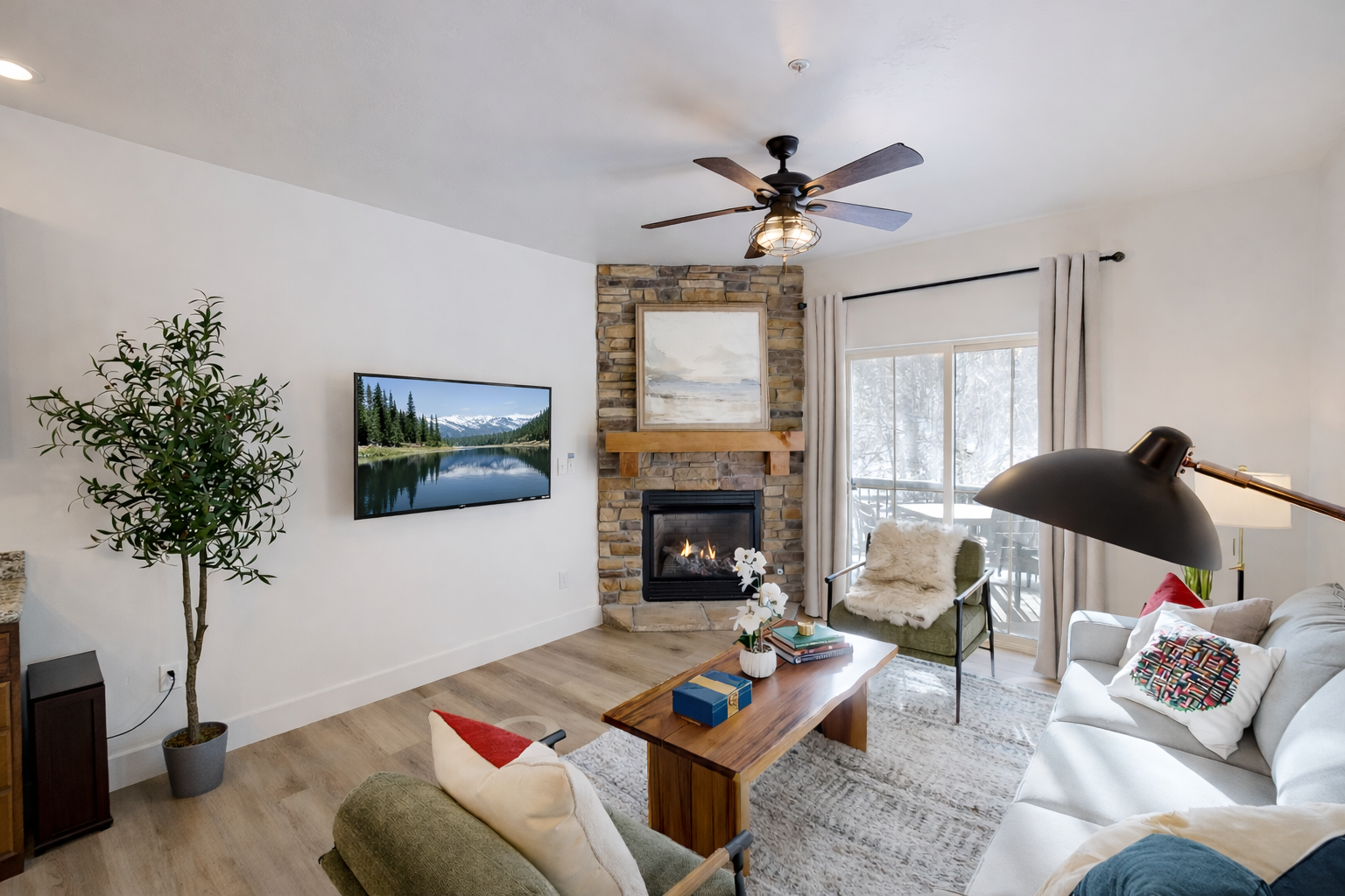 Relax in this stylish Park City retreat featuring a cozy stone fireplace, Olympic-themed decor, and mountain-view balcony. Just minutes from Canyons Village with access to a private clubhouse.