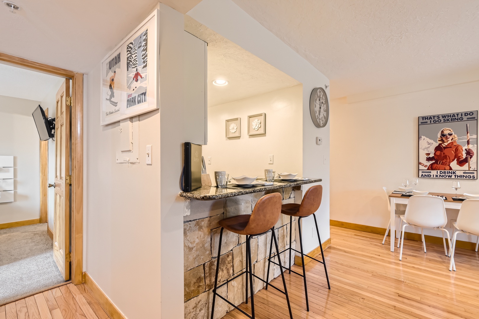 Cozy up to the breakfast bar with morning coffee, or gather at the dining table for meals and games—your open, welcoming space flows effortlessly from kitchen to conversation.