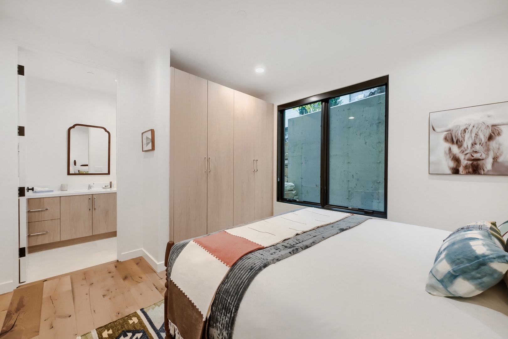 Settle into your bright and airy bedroom, where modern comfort meets thoughtful design. Ample storage keeps your space tidy, while natural light filters in through the frosted window, creating a peaceful retreat at the end of each day.