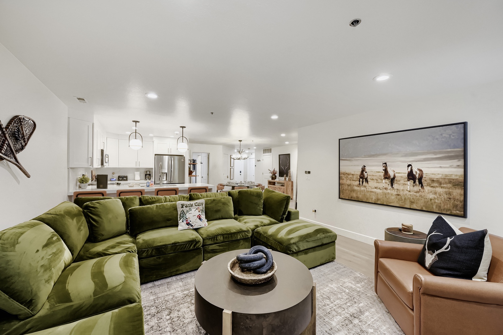 Sink into the plush green sectional and unwind