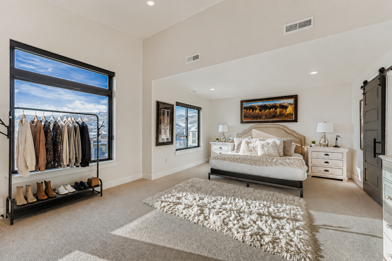 Rest peacefully in your elegant bedroom featuring plush bedding, stylish nightstands, and warm natural light streaming through your private window.